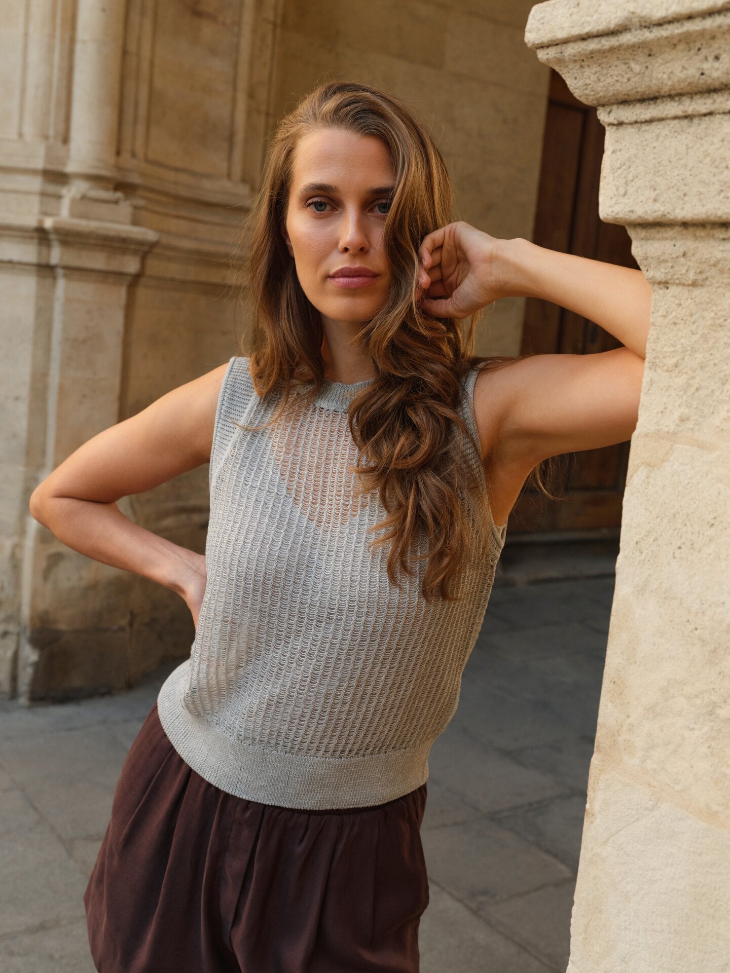 Open-knit top with matching underlayer