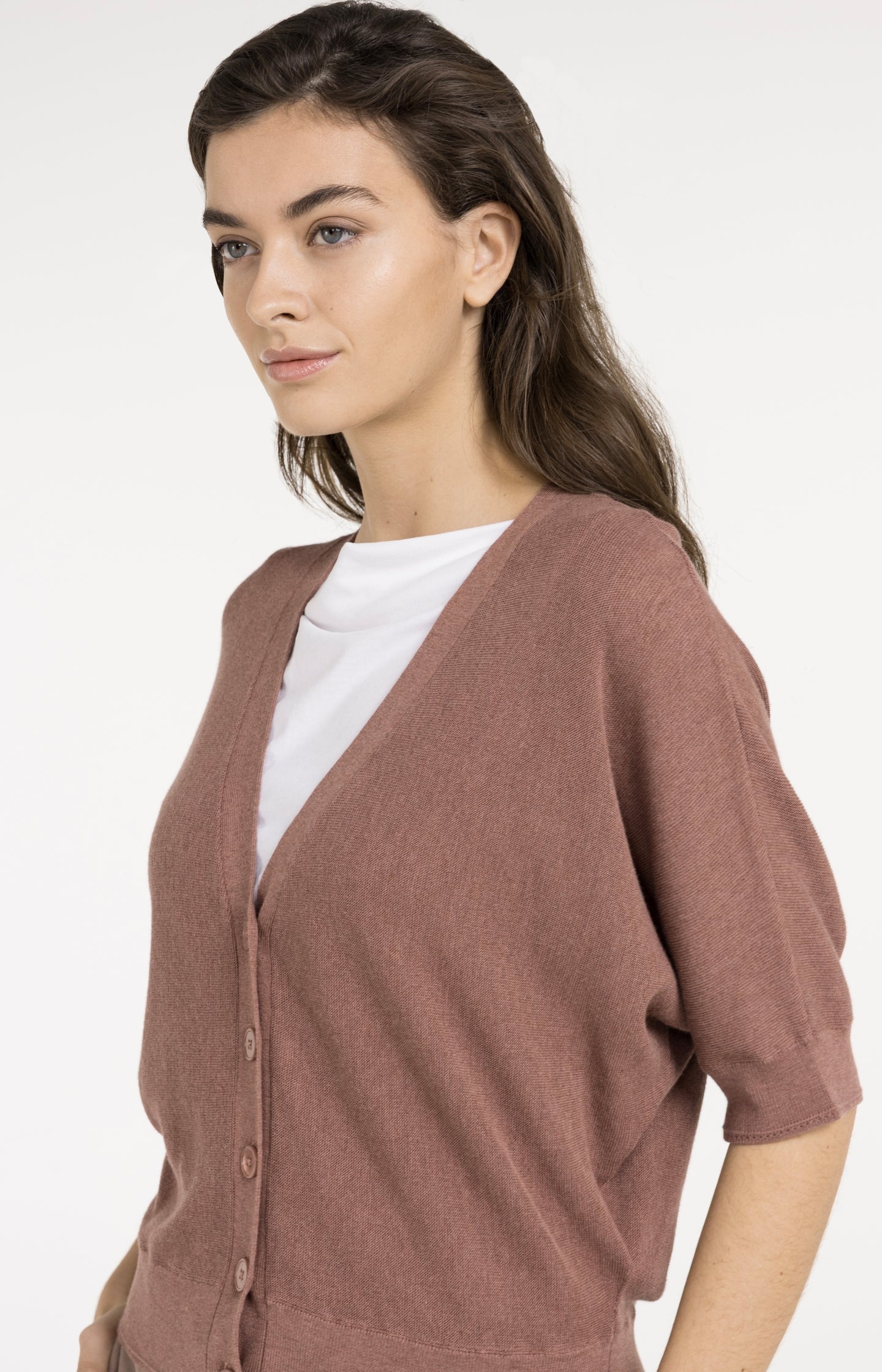 Batwing cardigan with short sleeves and button closure
