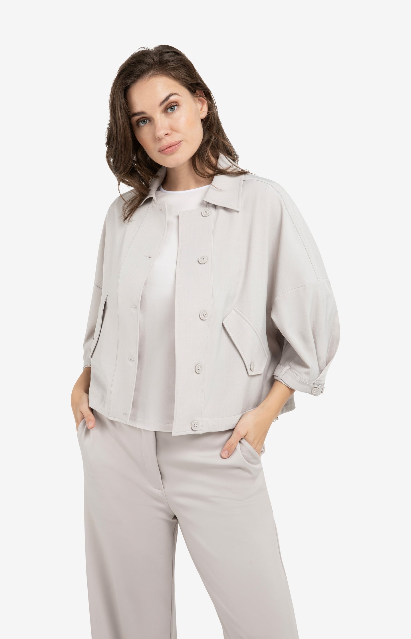 Blouse jacket with adjustable waistband and pockets