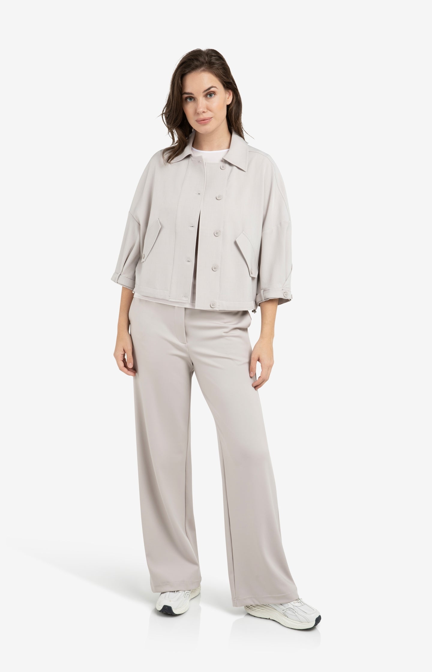 Blouse jacket with adjustable waistband and pockets