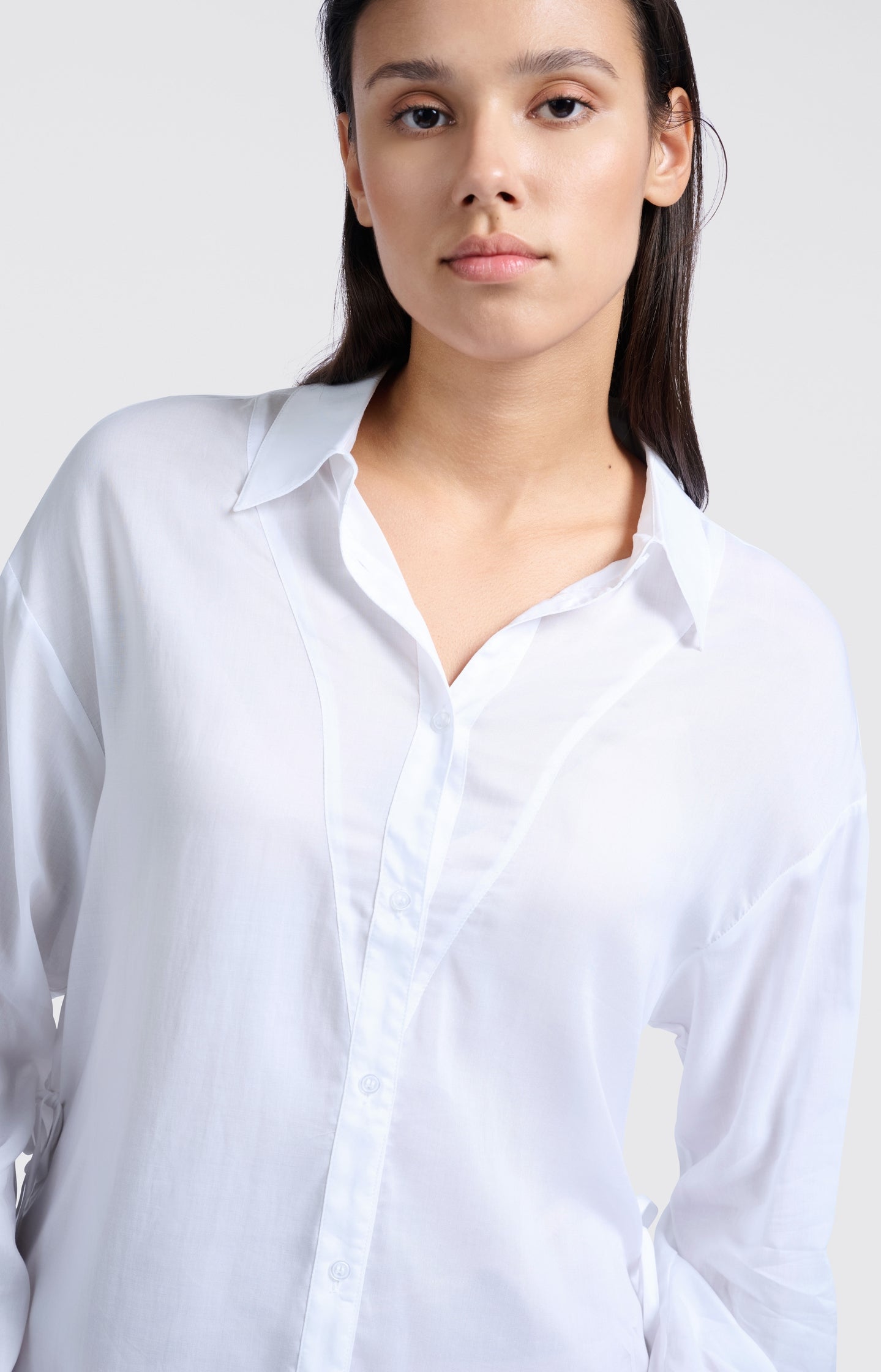 Blouse with adjustable tie strings