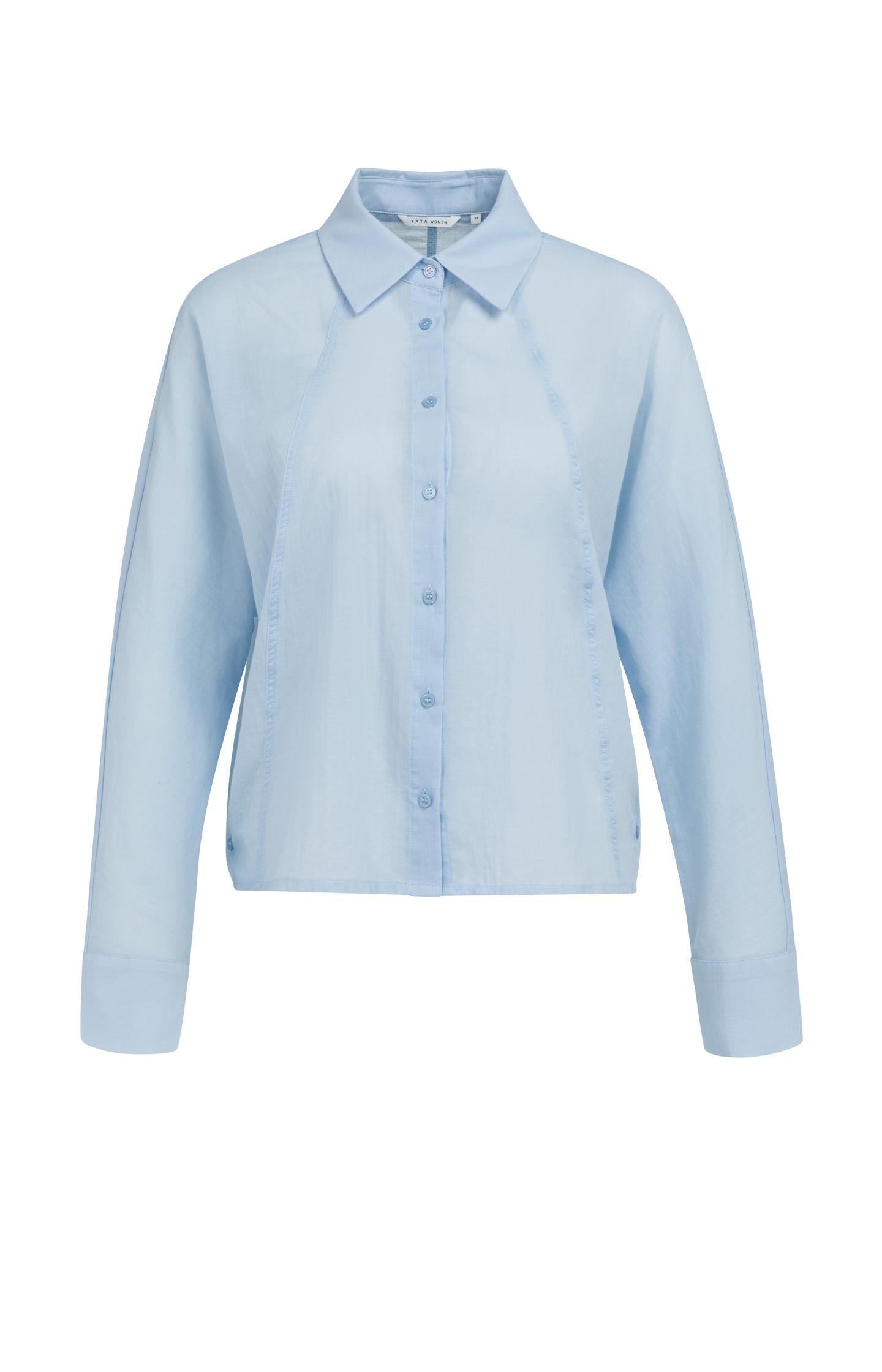 Blouse with angled seams and button details
