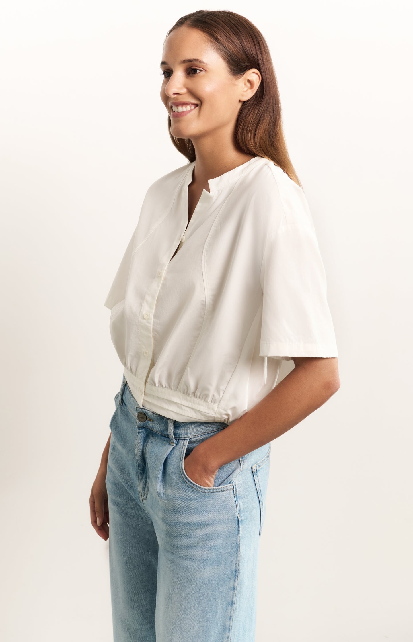Blouse with drawcord and refined stitching details