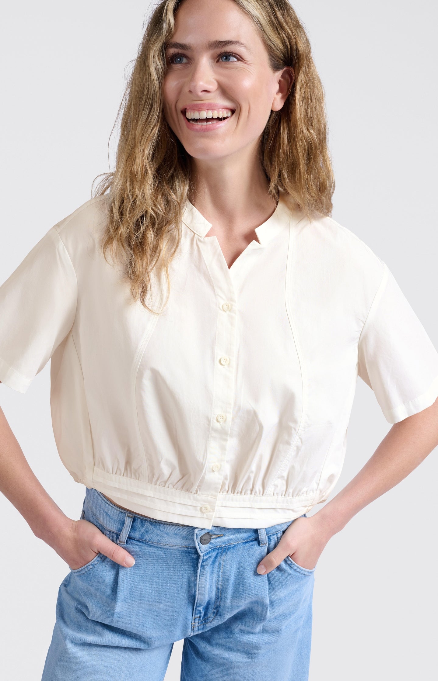Blouse with drawcord and refined stitching details