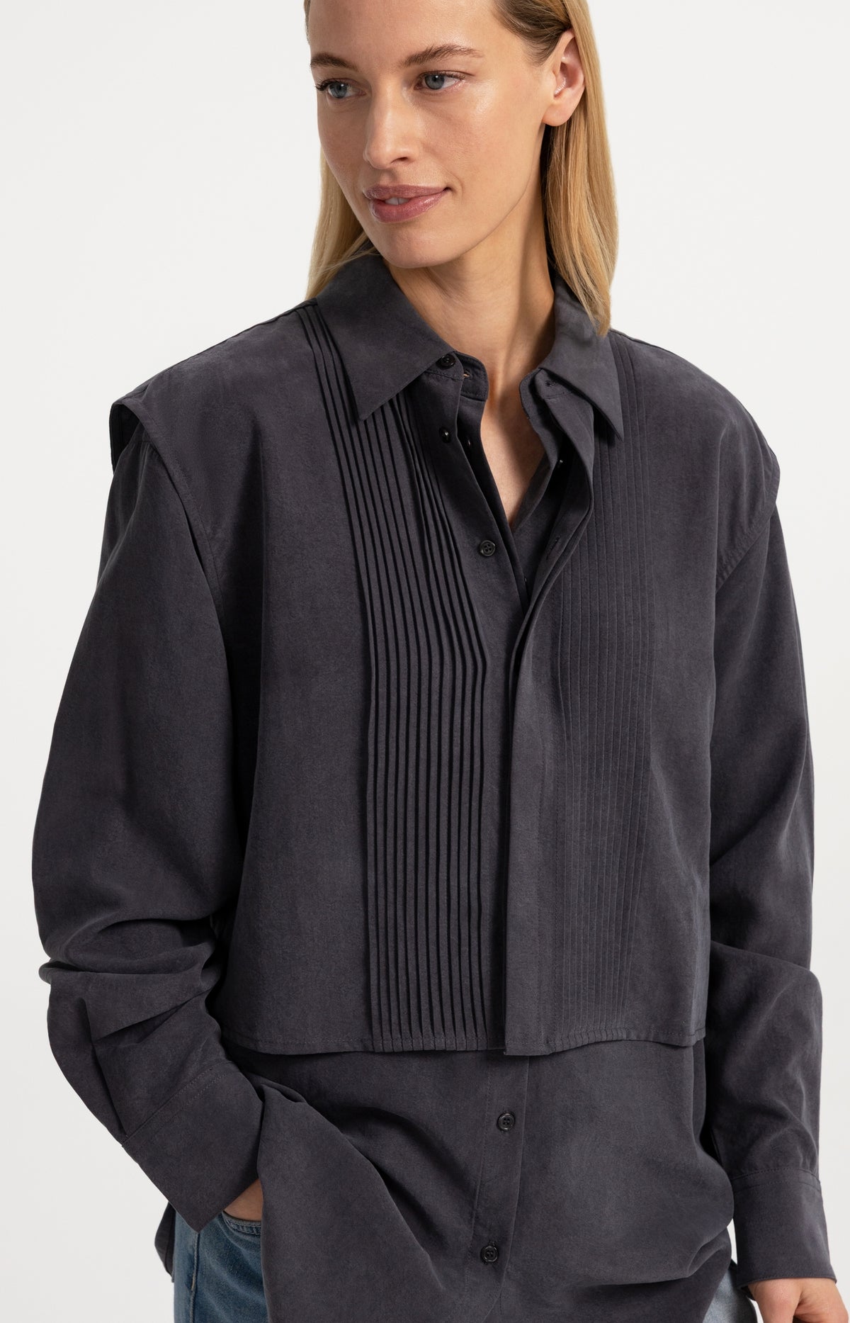 Blouse with layered gilet and pleated details