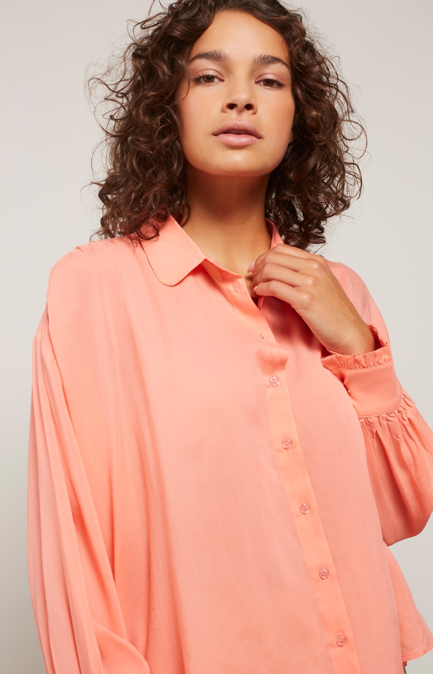 Blouse with long balloon sleeves, buttons and pleated detail