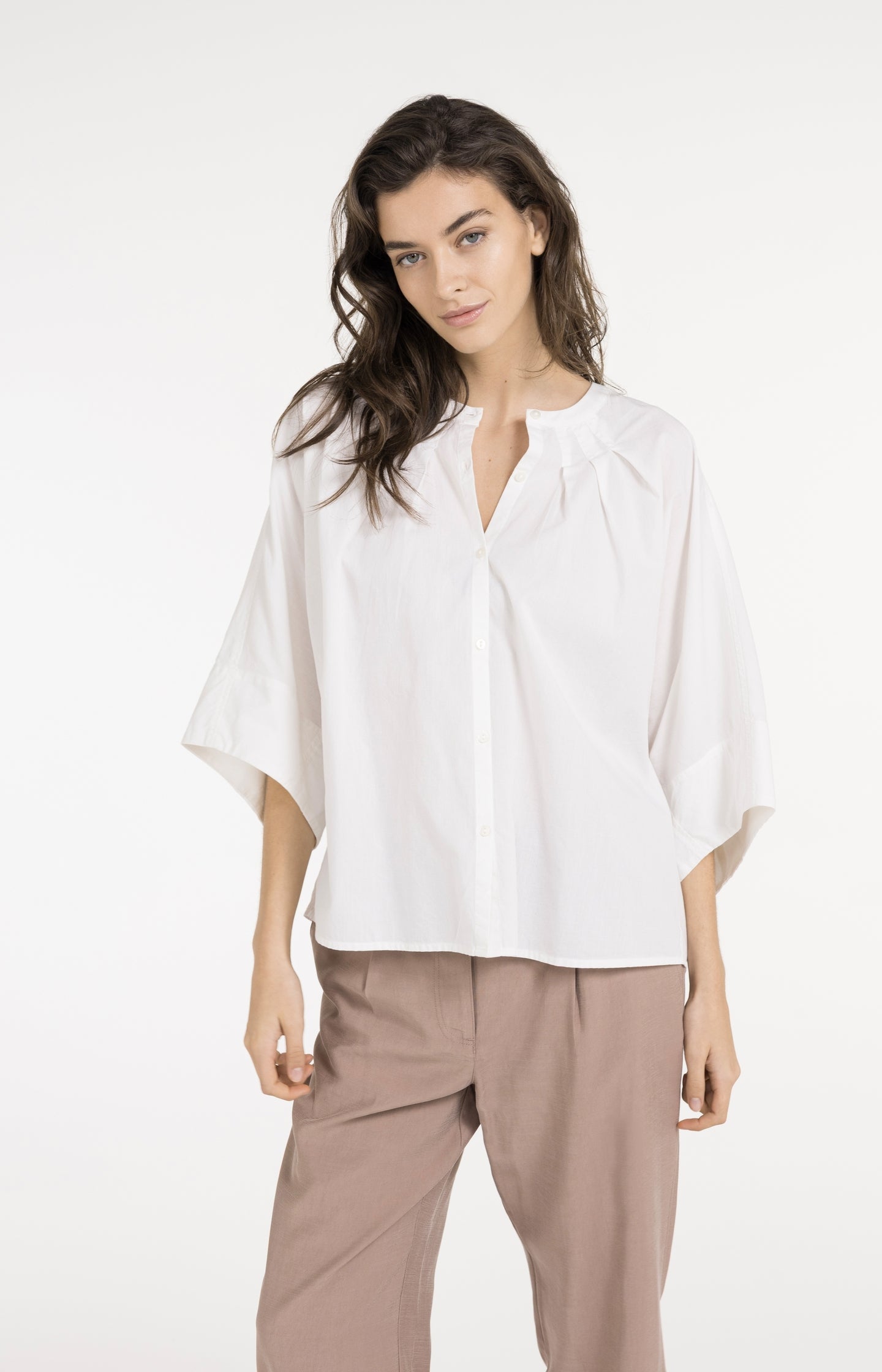 Blouse with short batwing sleeves and pleat details