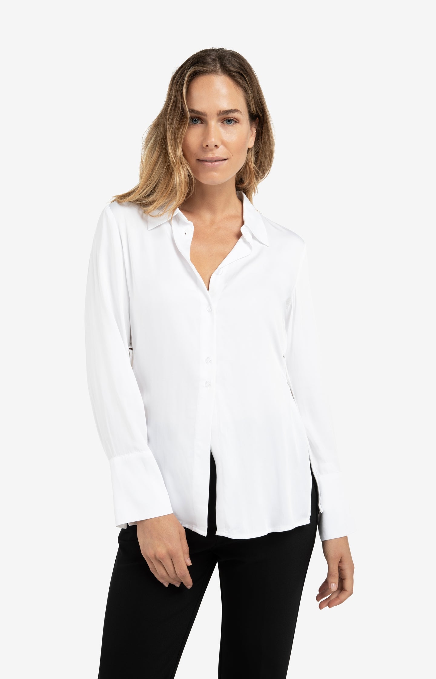 Blouse with subtle button detail and waist accent