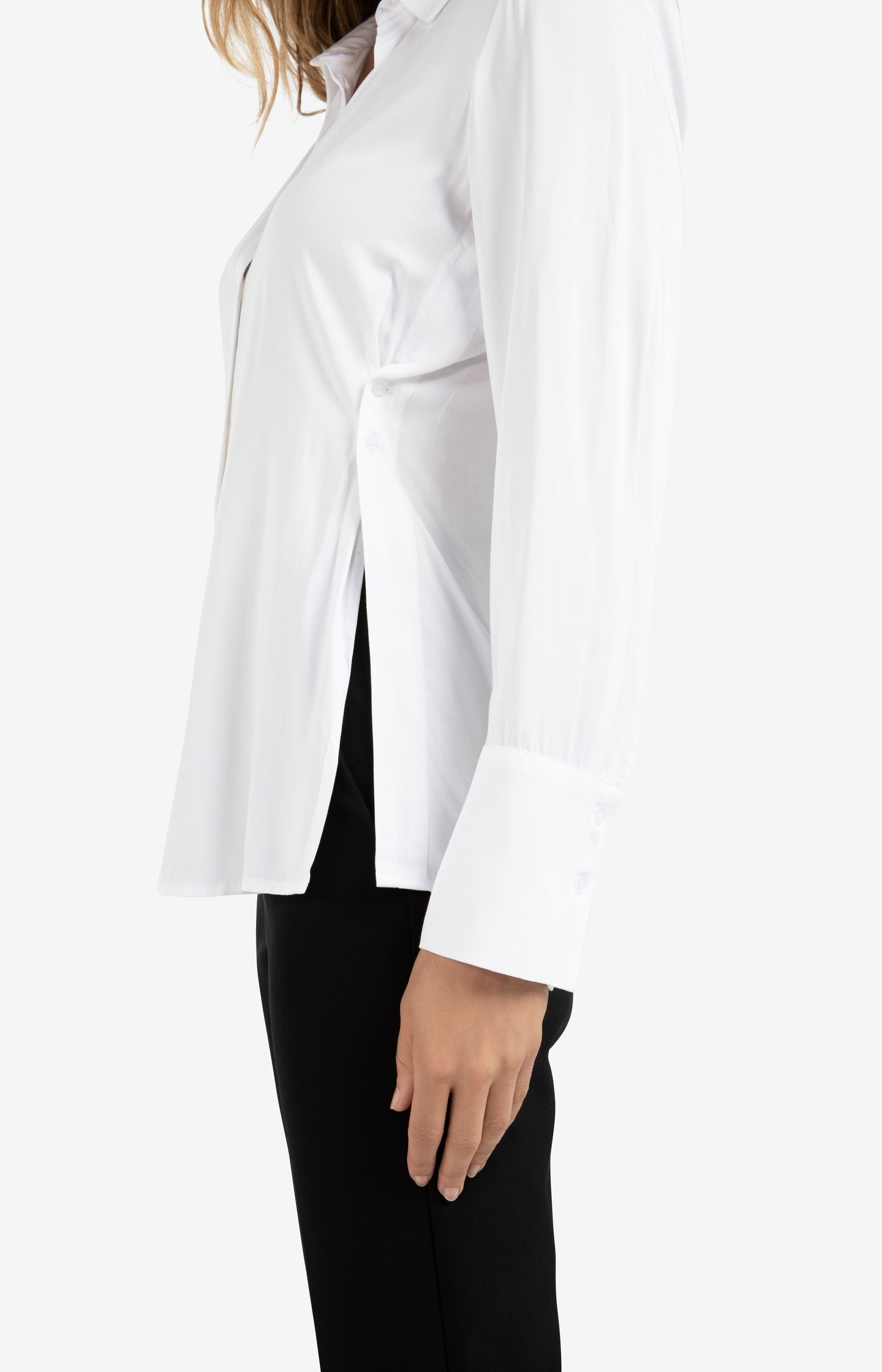 Blouse with subtle button detail and waist accent