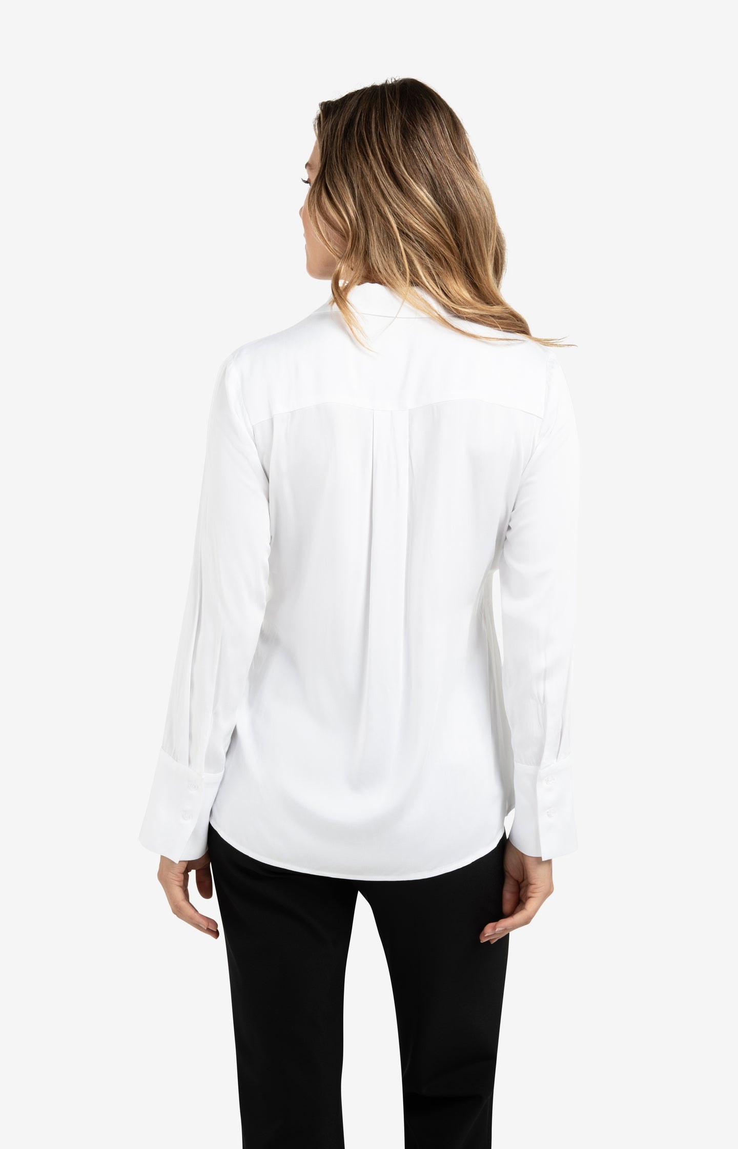 Blouse with subtle button detail and waist accent
