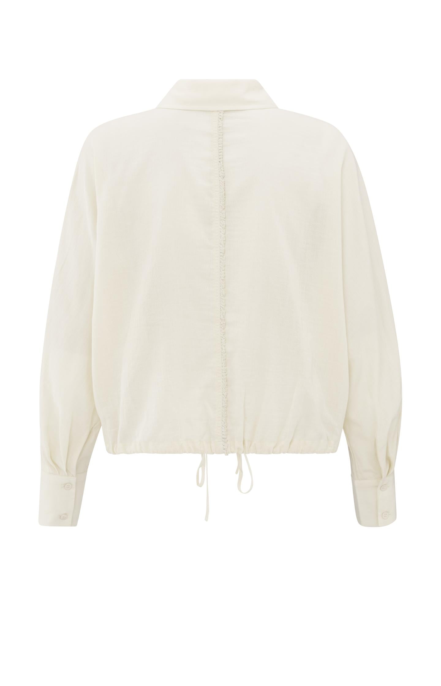 Blouse with subtle stitching details