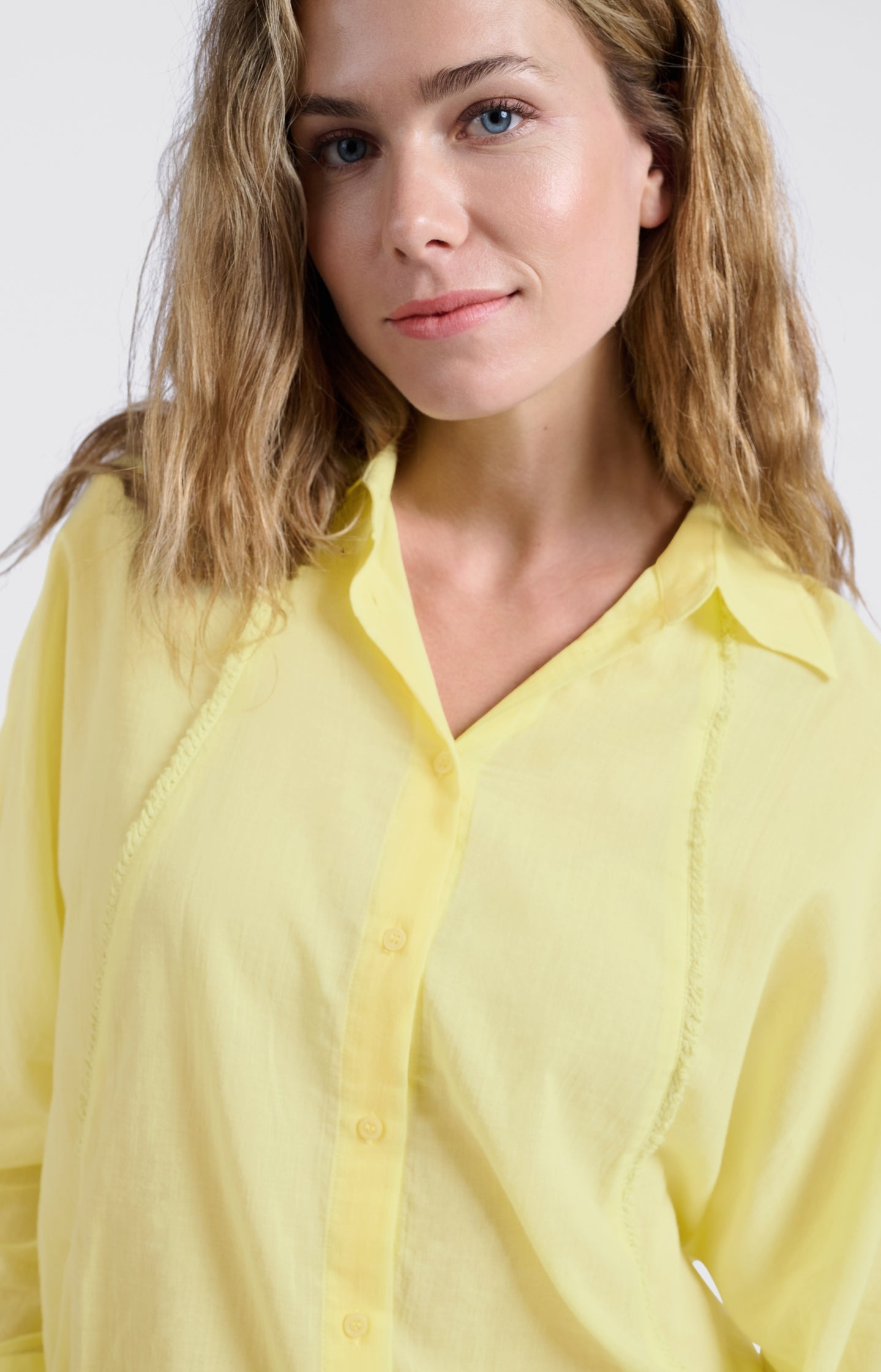 Blouse with subtle stitching details