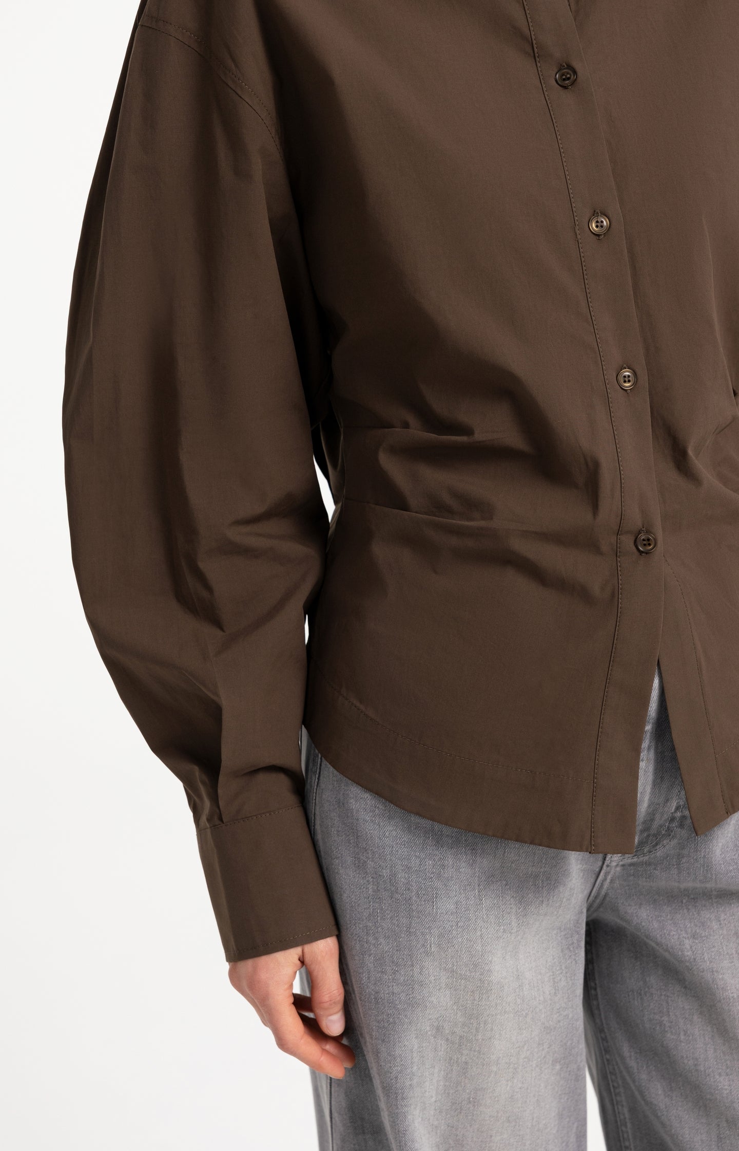 Blouse with waist accent and pleat detail