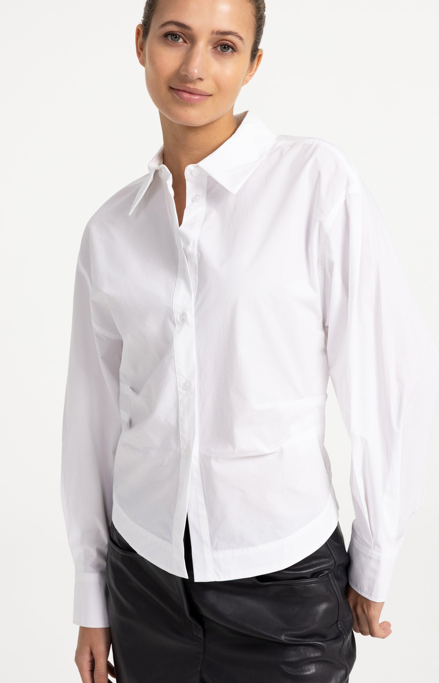 Blouse with waist accent and pleat detail