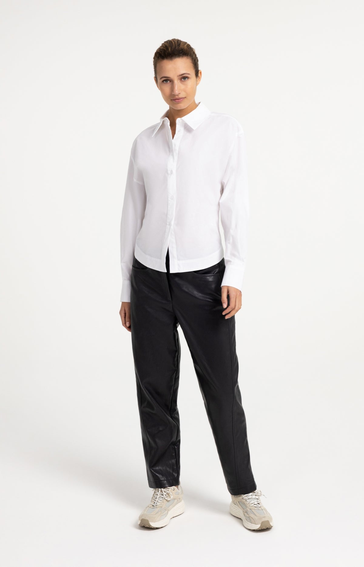 Blouse with waist accent and pleat detail