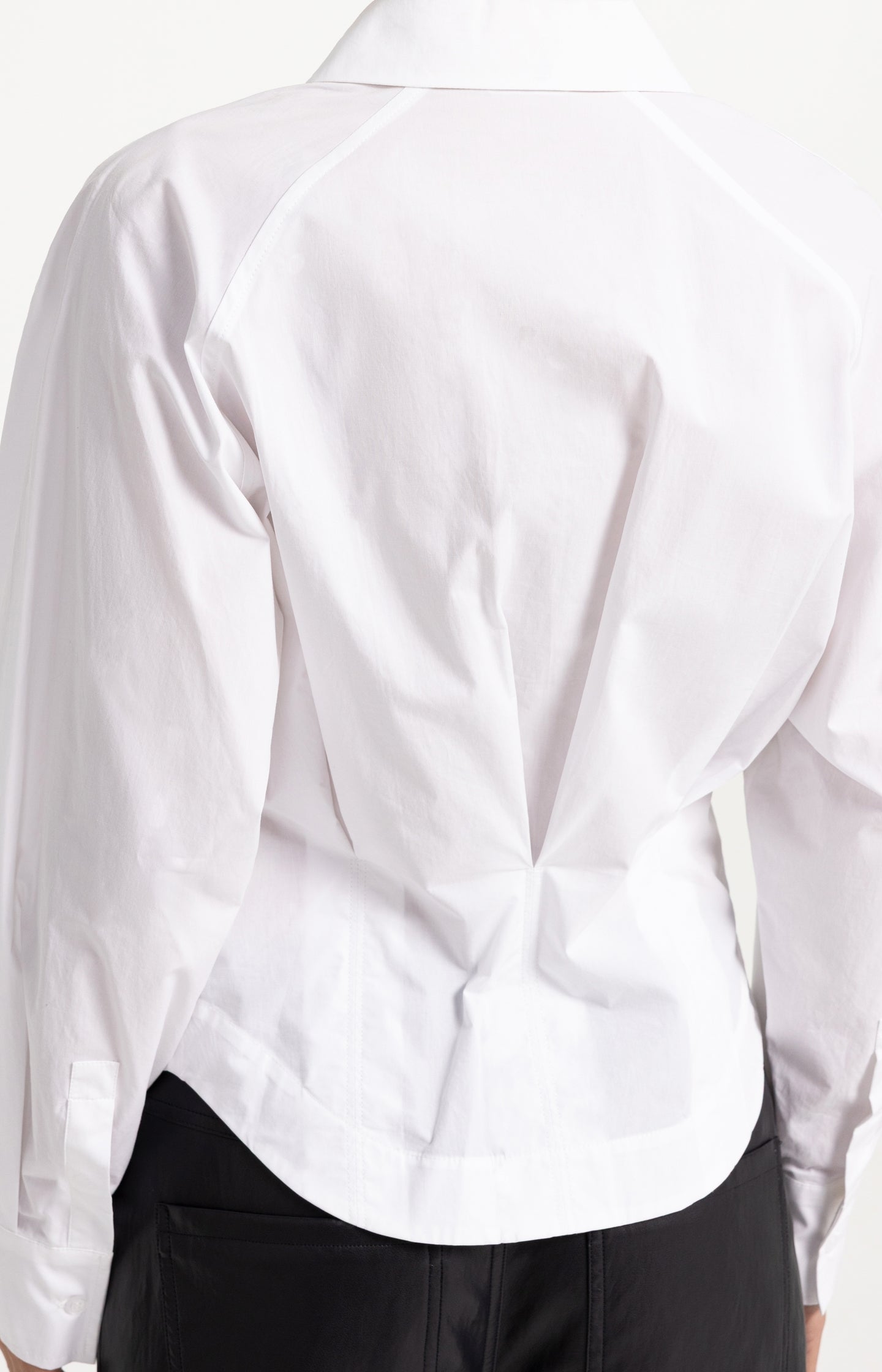 Blouse with waist accent and pleat detail