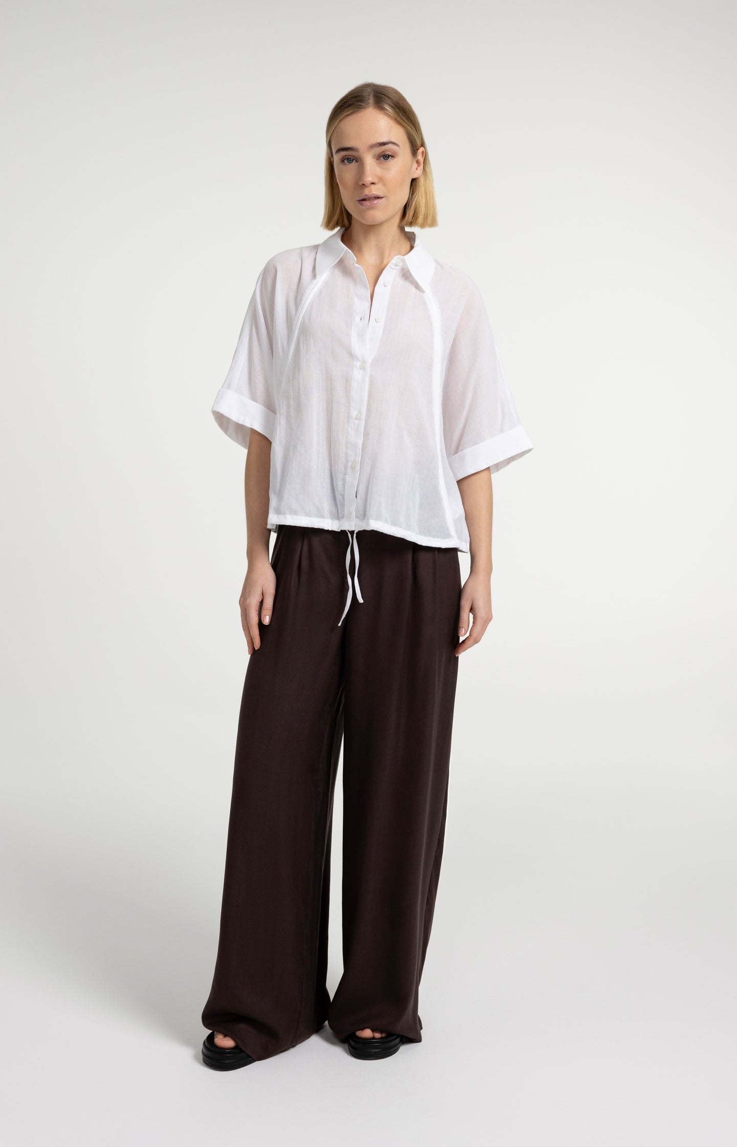 Blouse with wide sleeves and braided details