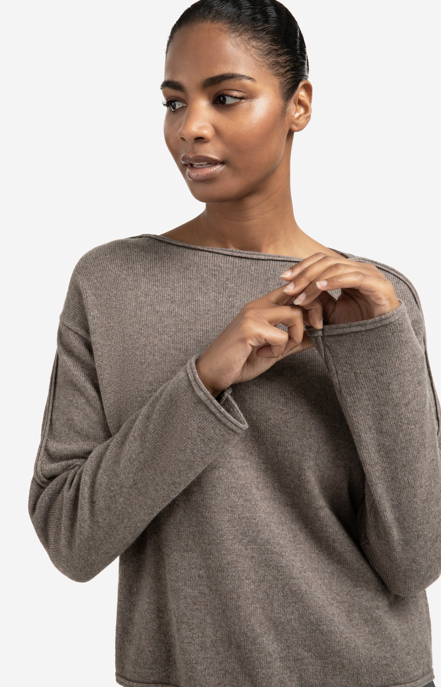 Boat neck sweater with refined decorative seams