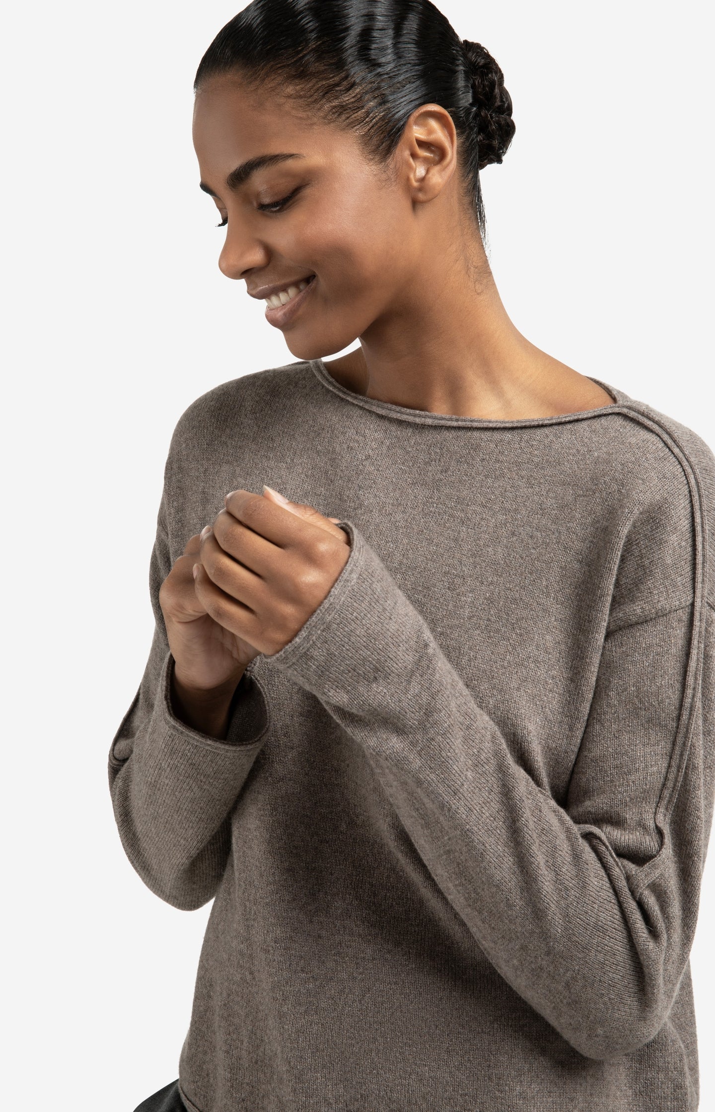 Boat neck sweater with refined decorative seams