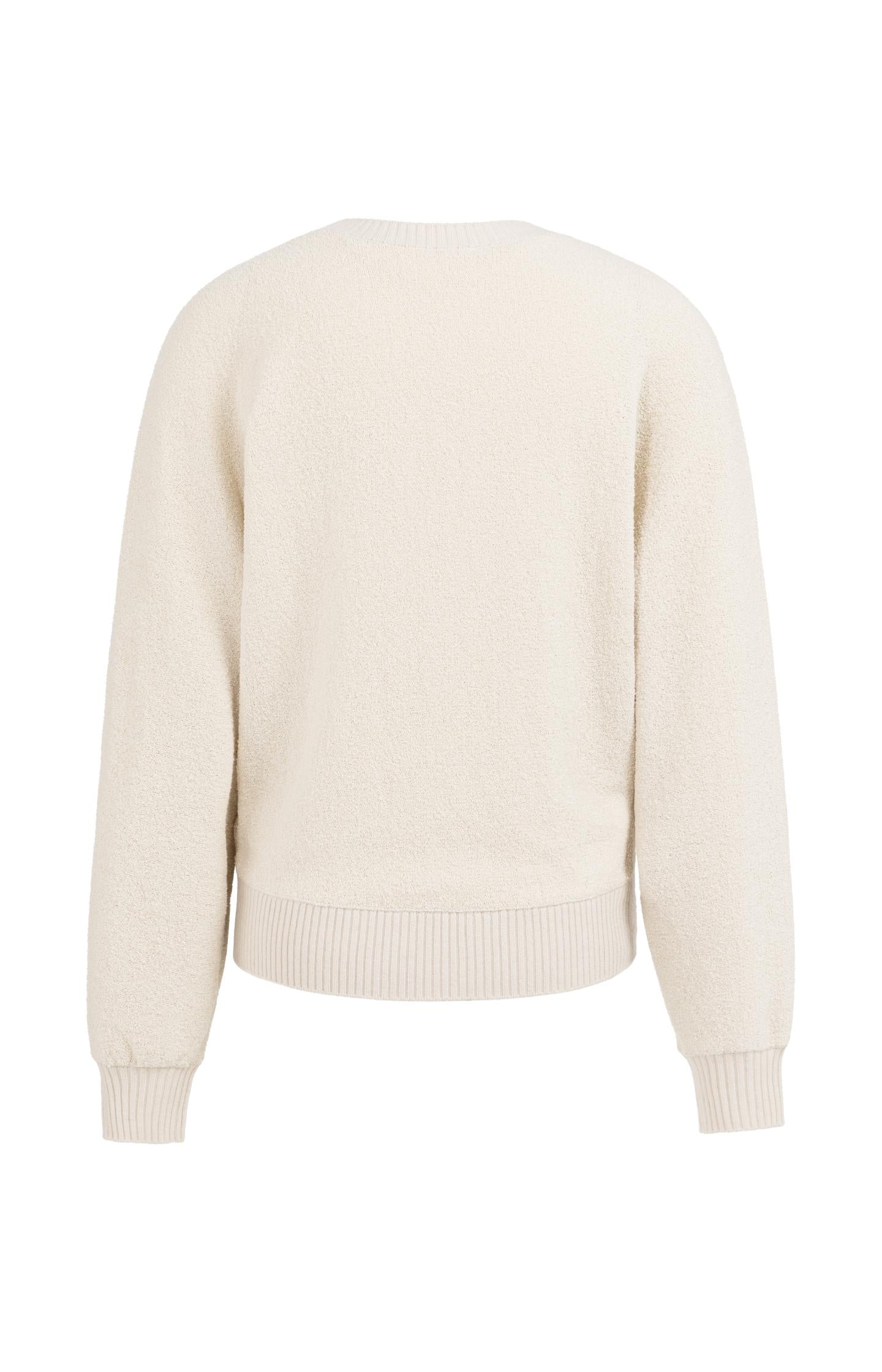 Bouclé sweater with batwing sleeves and ribbed trims