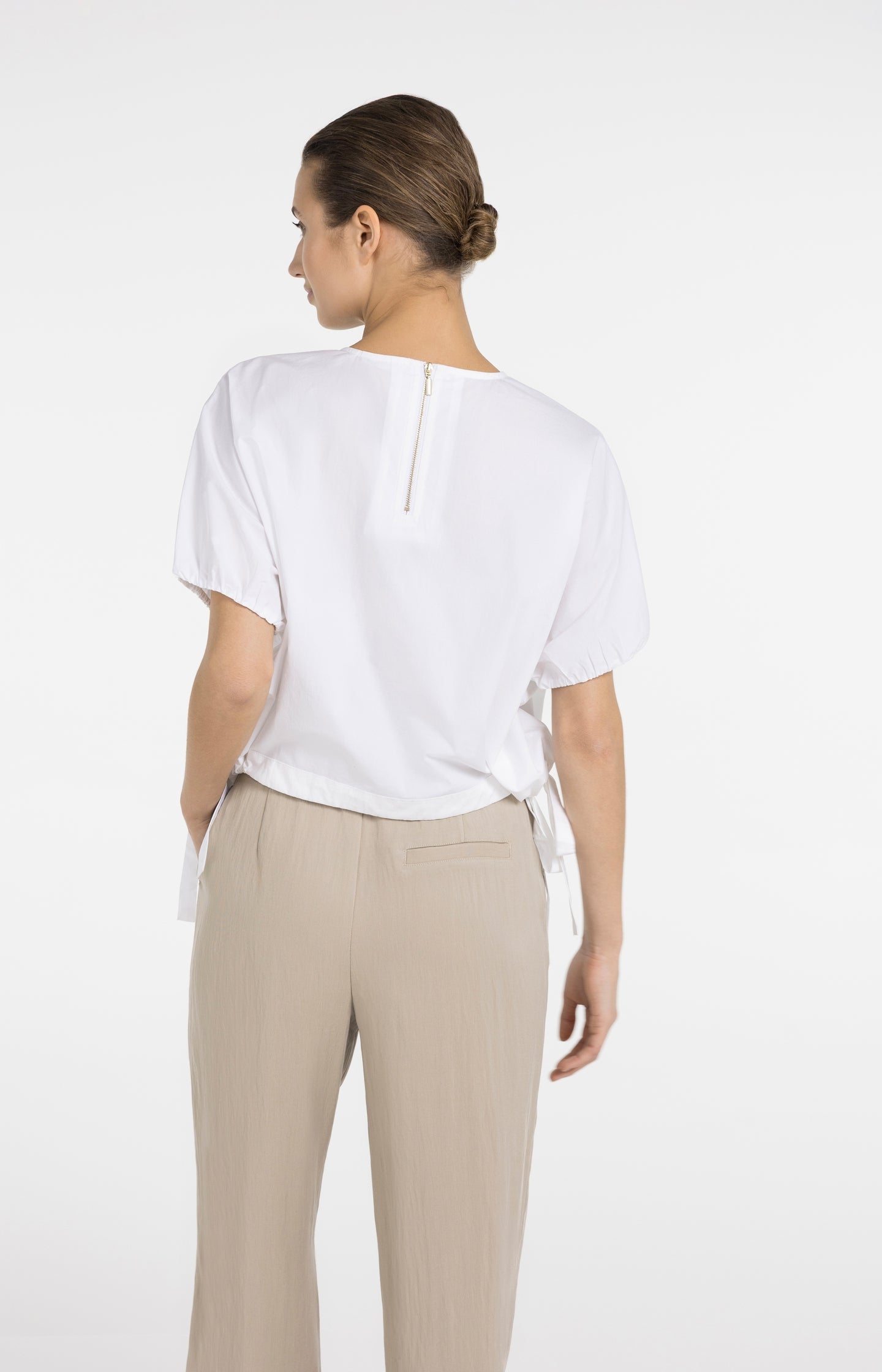 Boxy top met verstelbare taille en pofmouwen