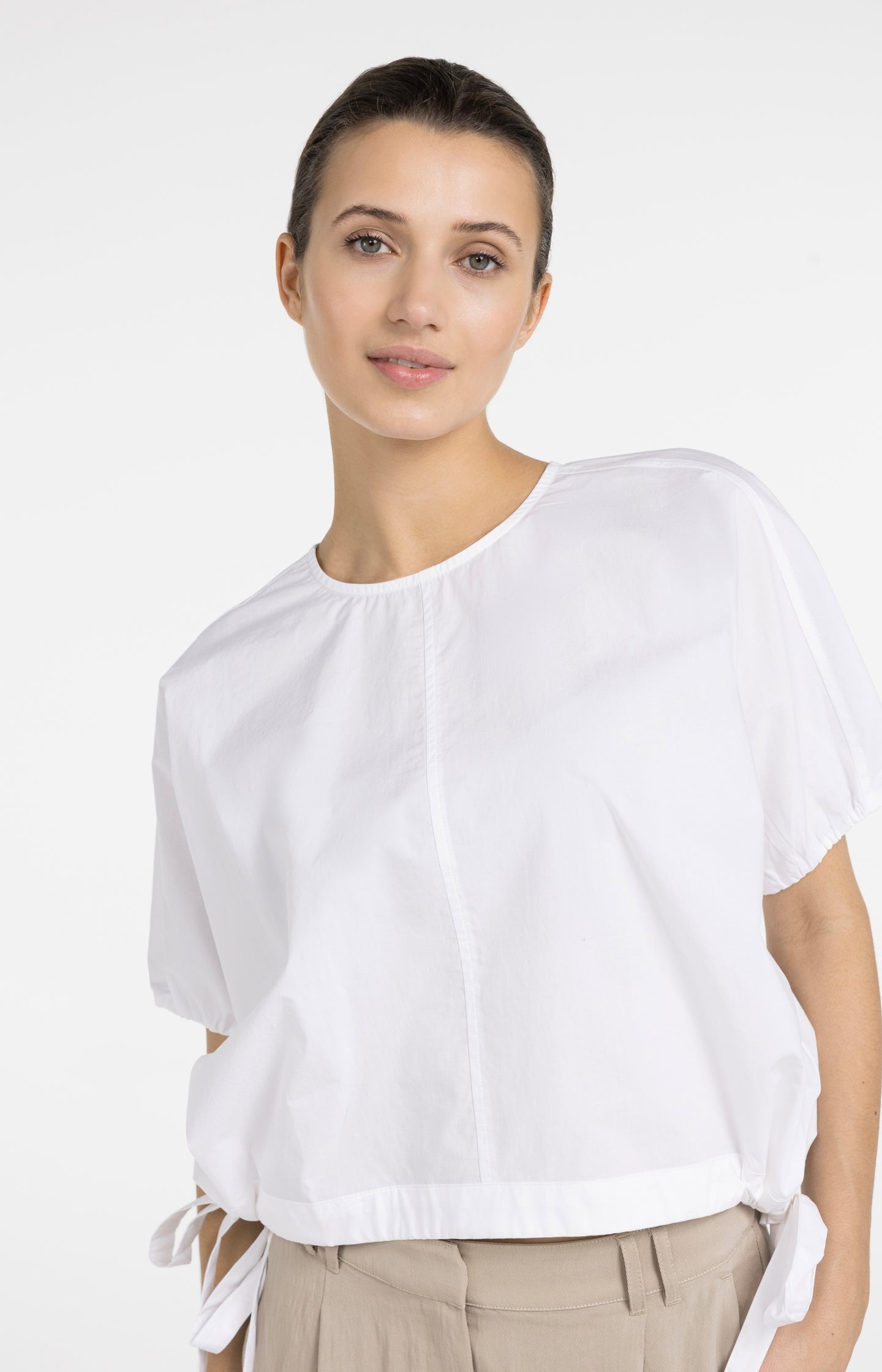Boxy top met verstelbare taille en pofmouwen