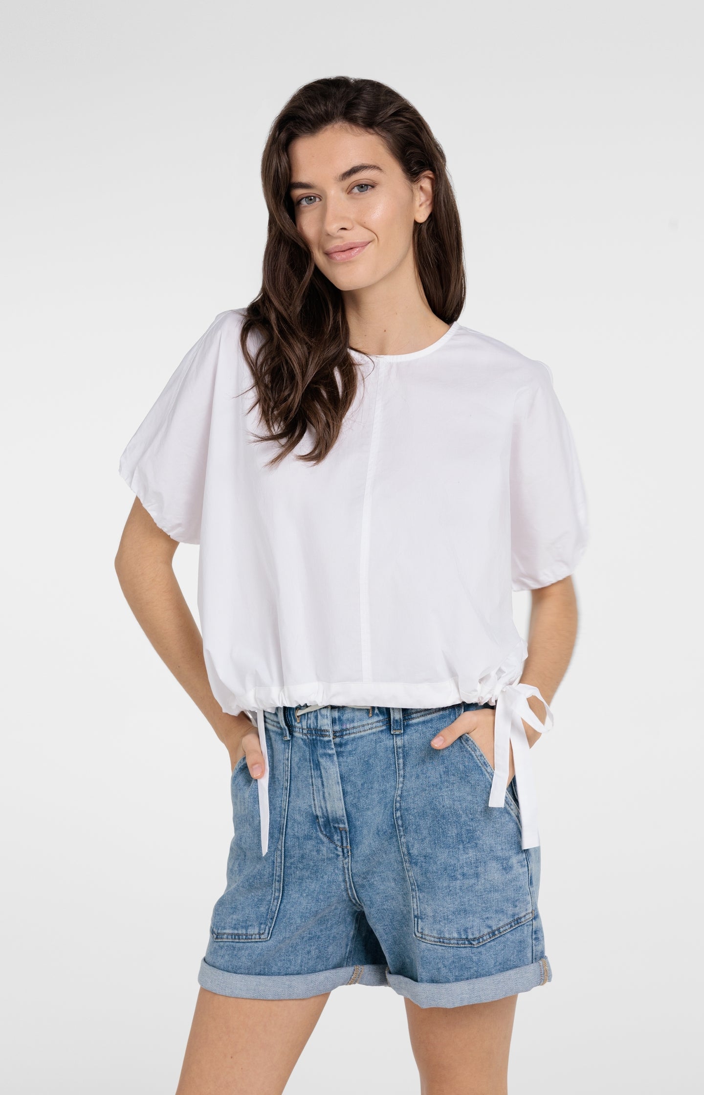 Boxy top met verstelbare taille en pofmouwen