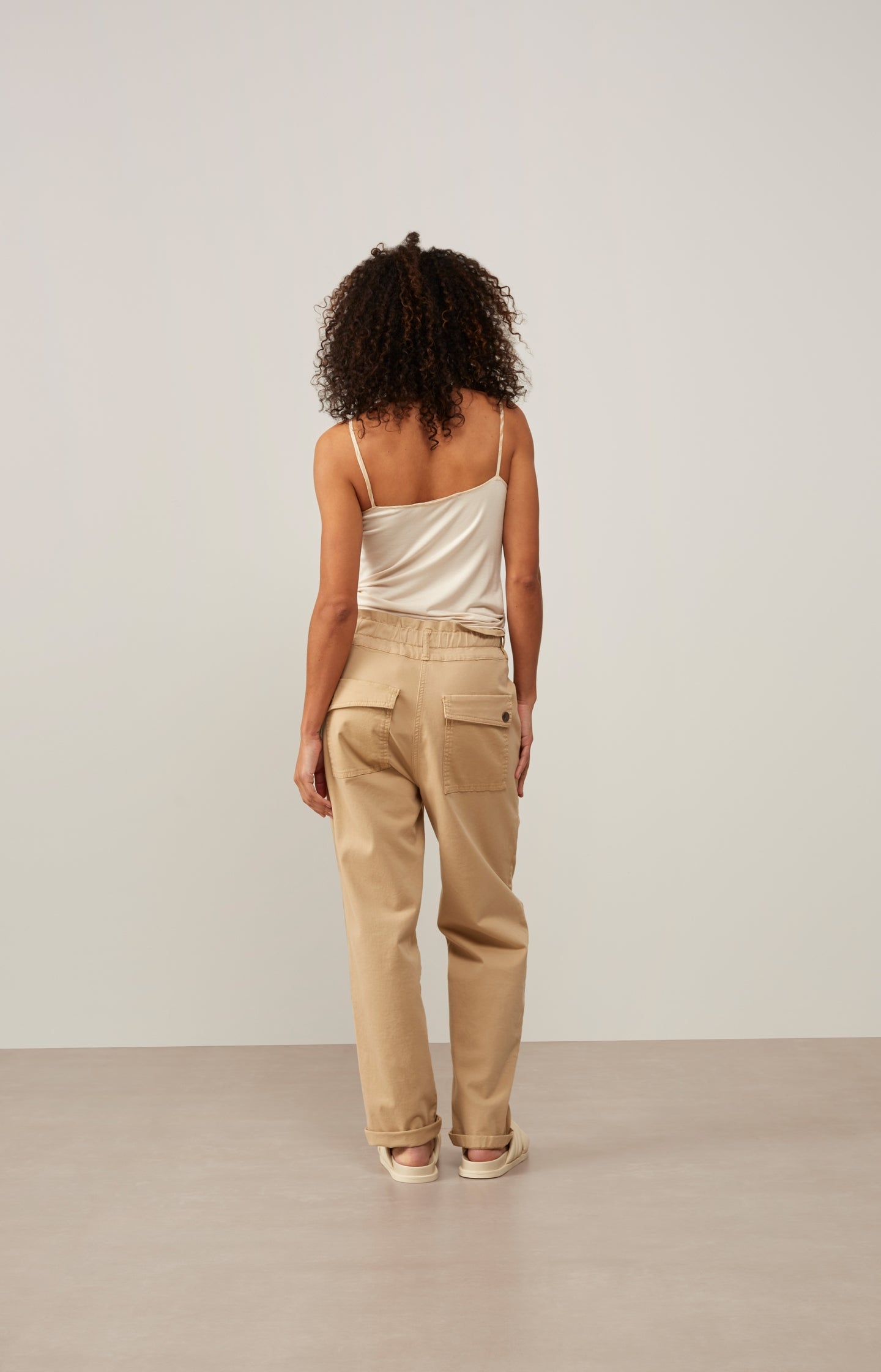 Cargo trousers with paperbag waist pockets and buttons