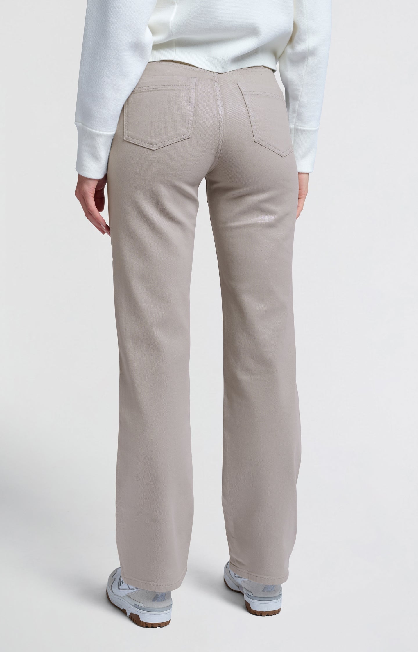 Coated denim trousers with wide legs and mid-rise waist