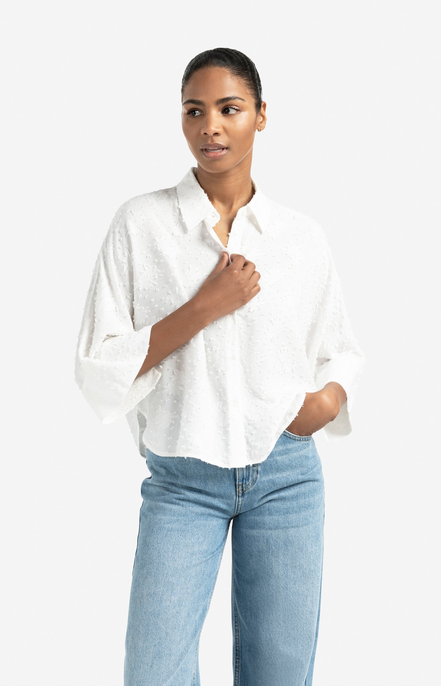 Cropped airy blouse with woven-in details