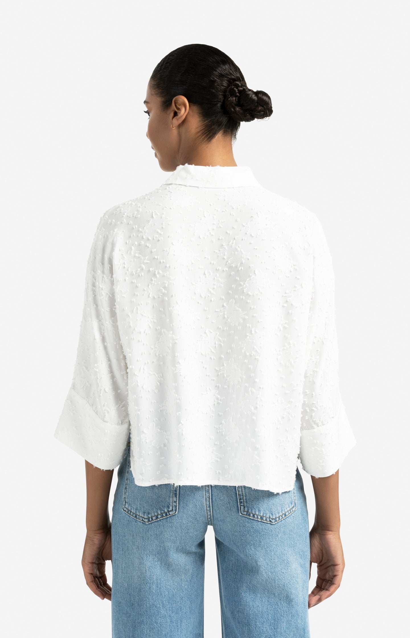 Cropped airy blouse with woven-in details