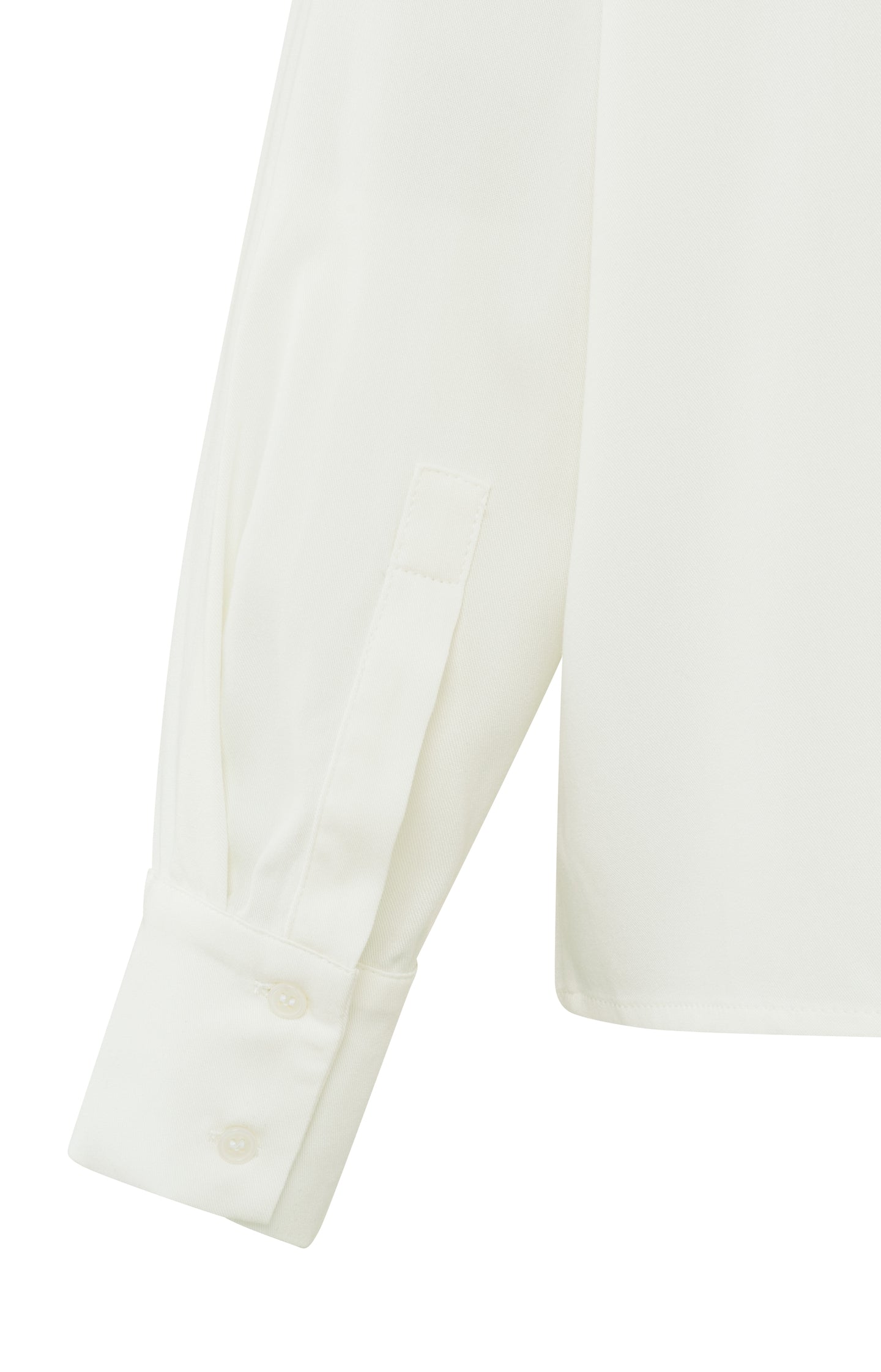 Cropped blouse with long sleeves and button closure