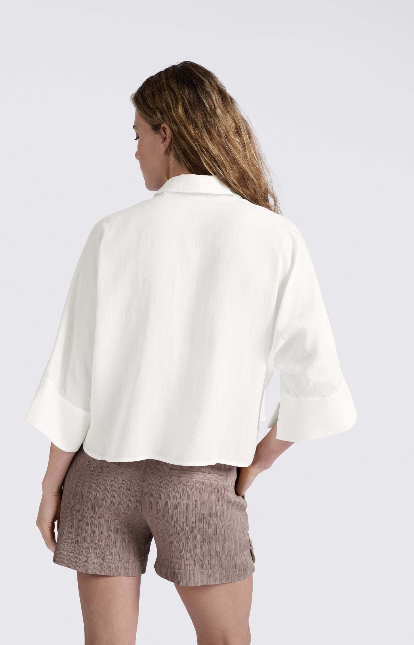 Cropped blouse with wide sleeves and loose fit