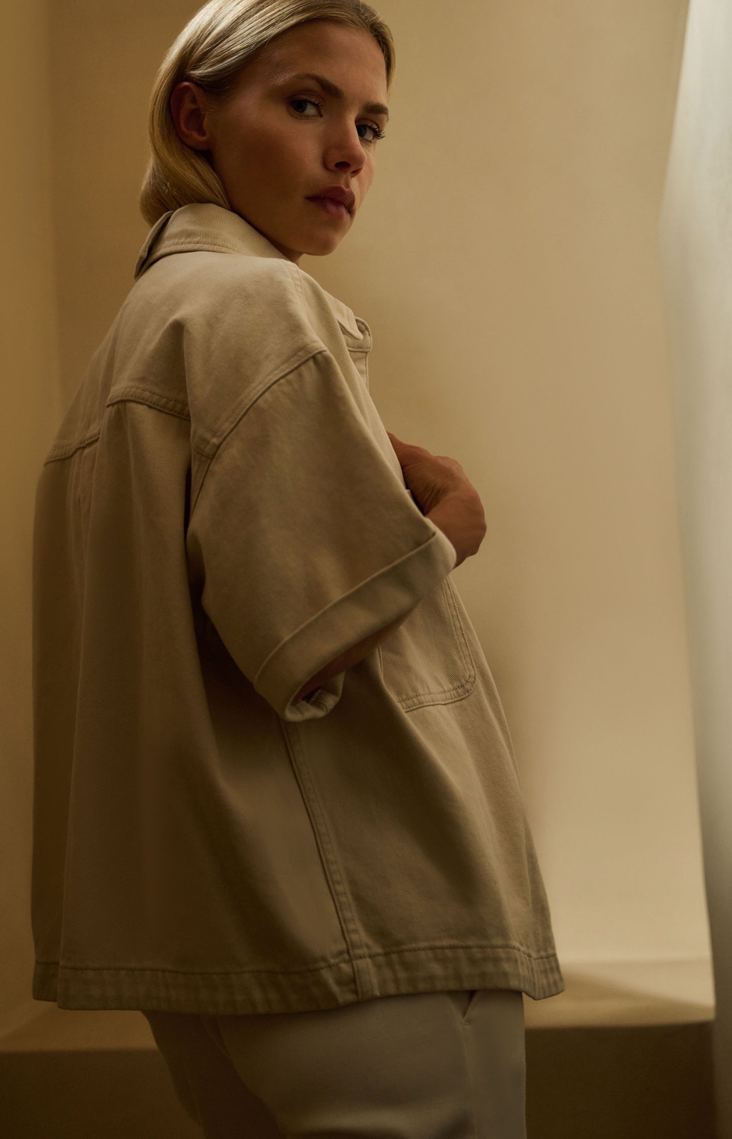 Denim jacket with short sleeves and patch pockets