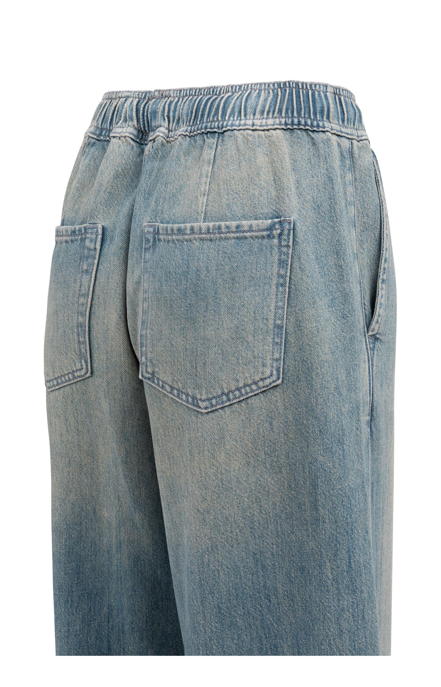 Denim trousers with wide legs and drawstring - Type: video