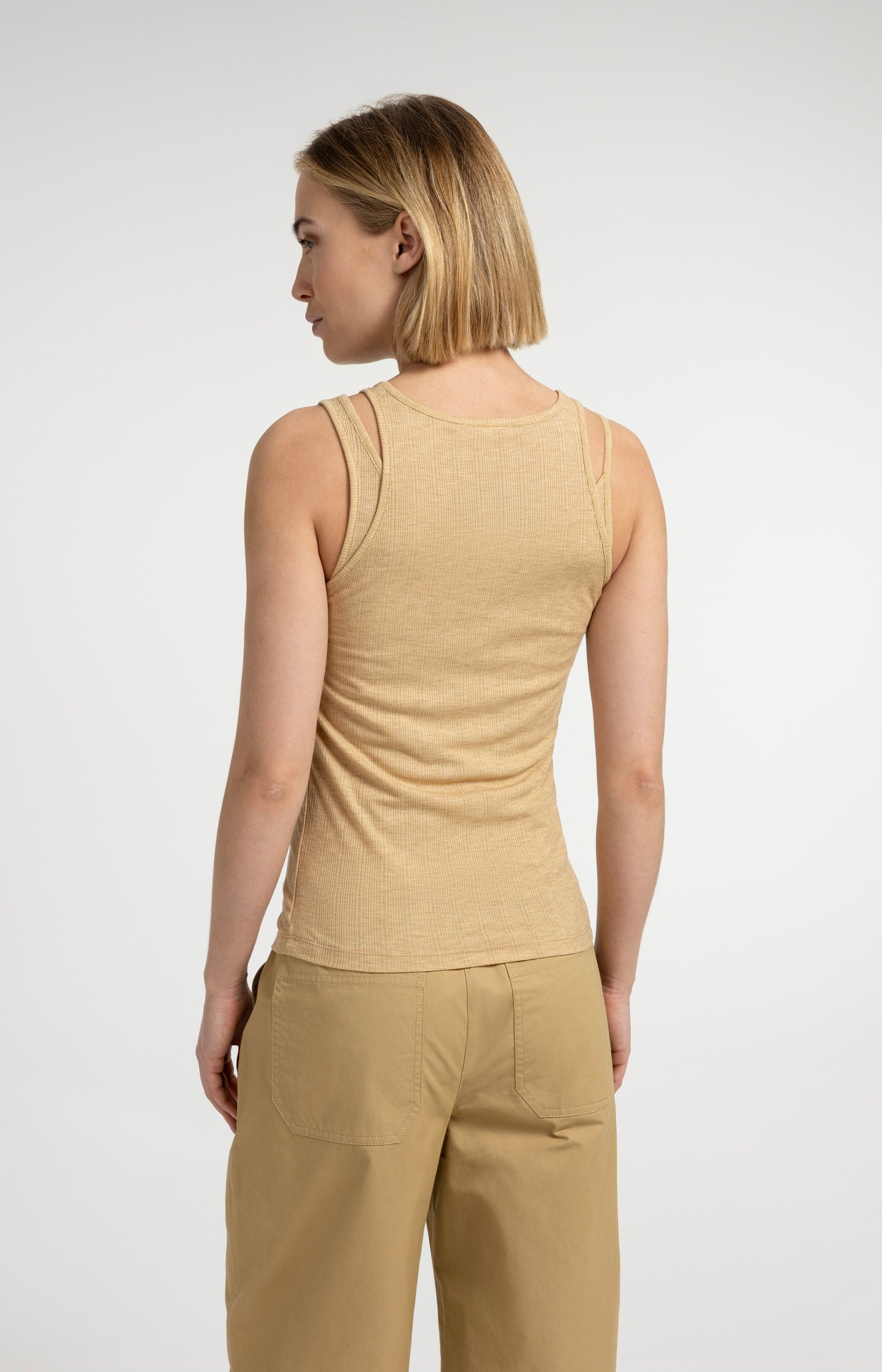 Double-layer singlet with asymmetric straps - Type: lookbook