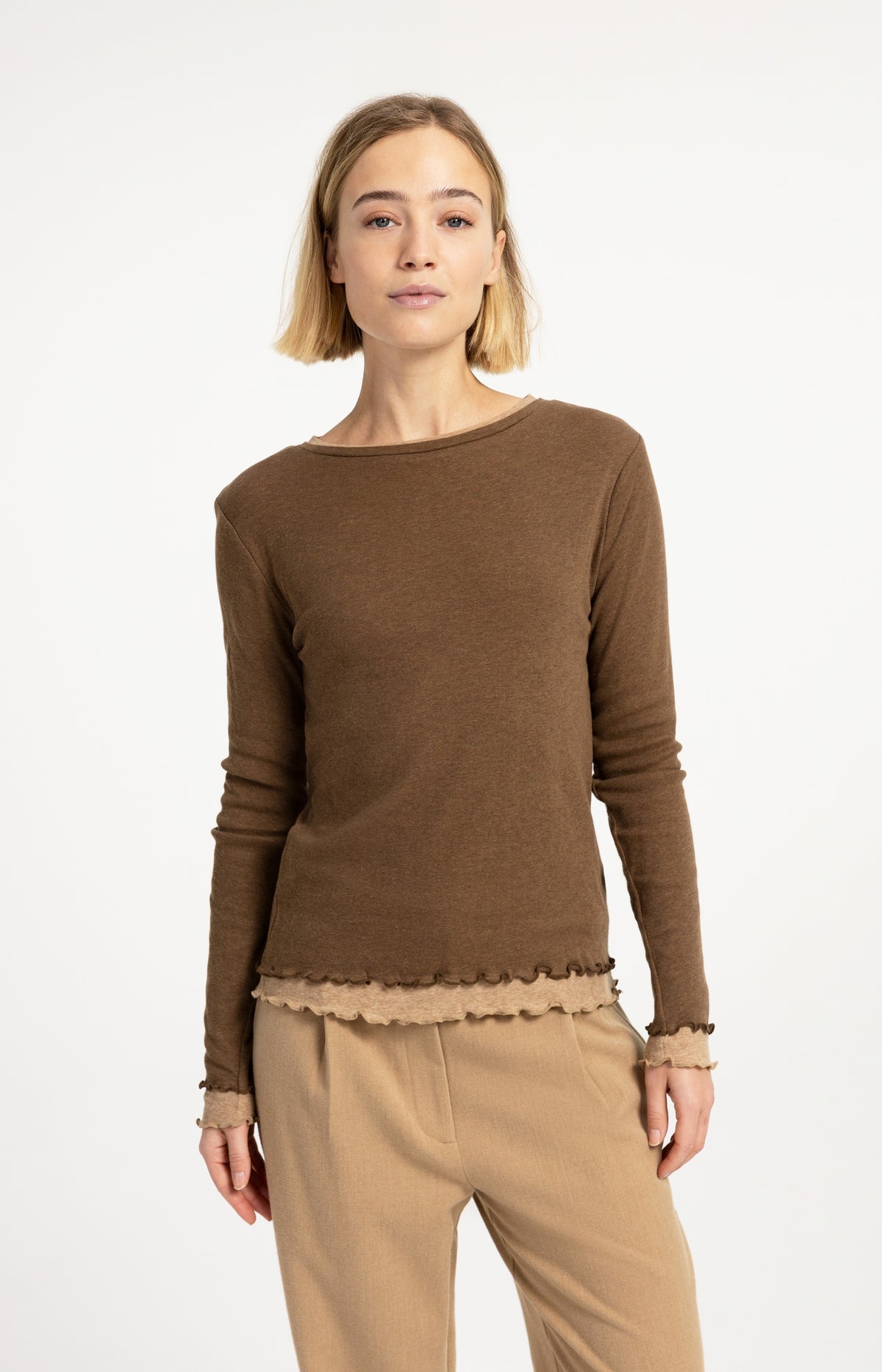 Double layer top with ruffles and long sleeves