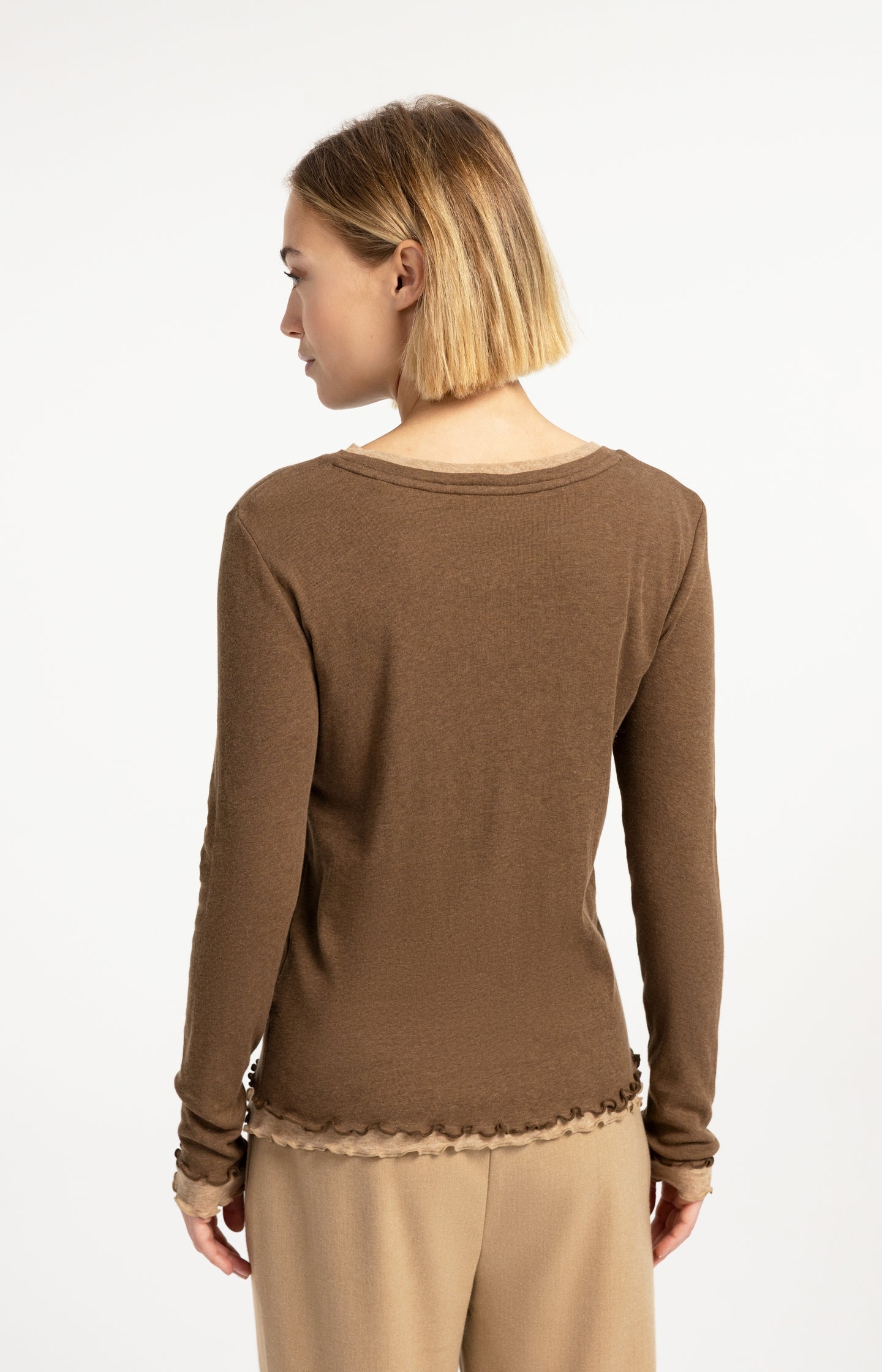 Double layer top with ruffles and long sleeves