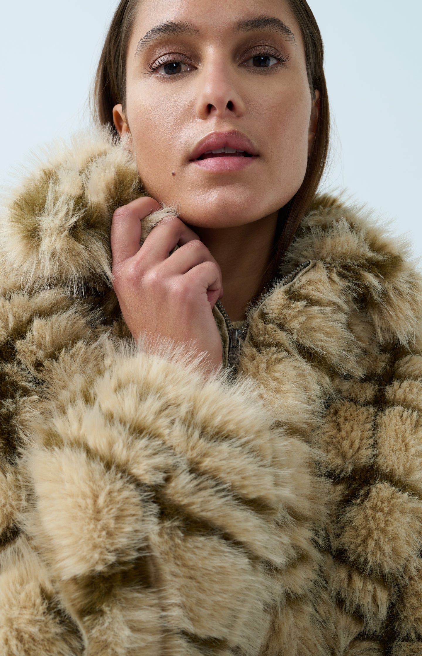 Faux fur jacket with collar and check pattern