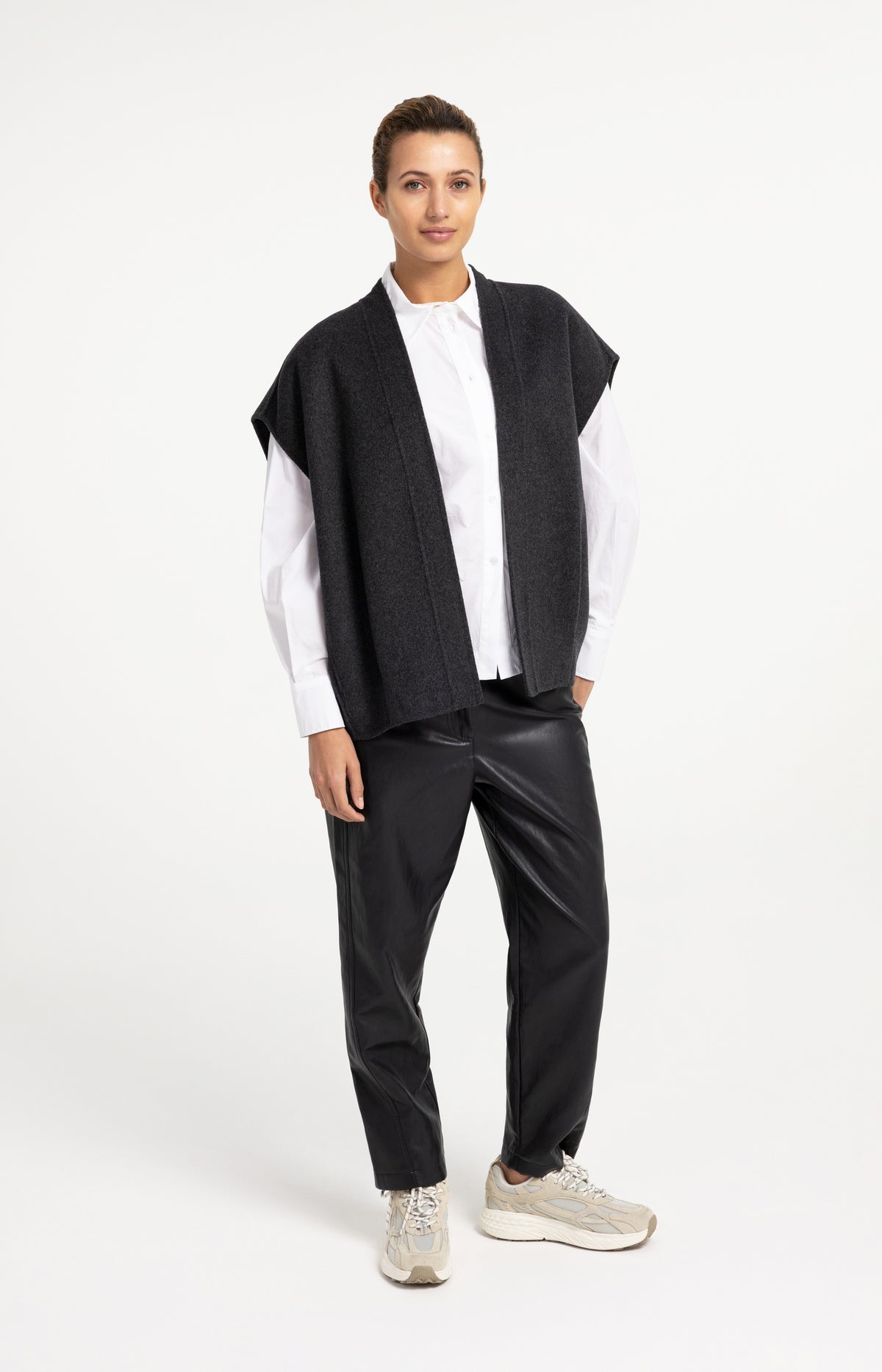 Faux leather carrot fit trousers