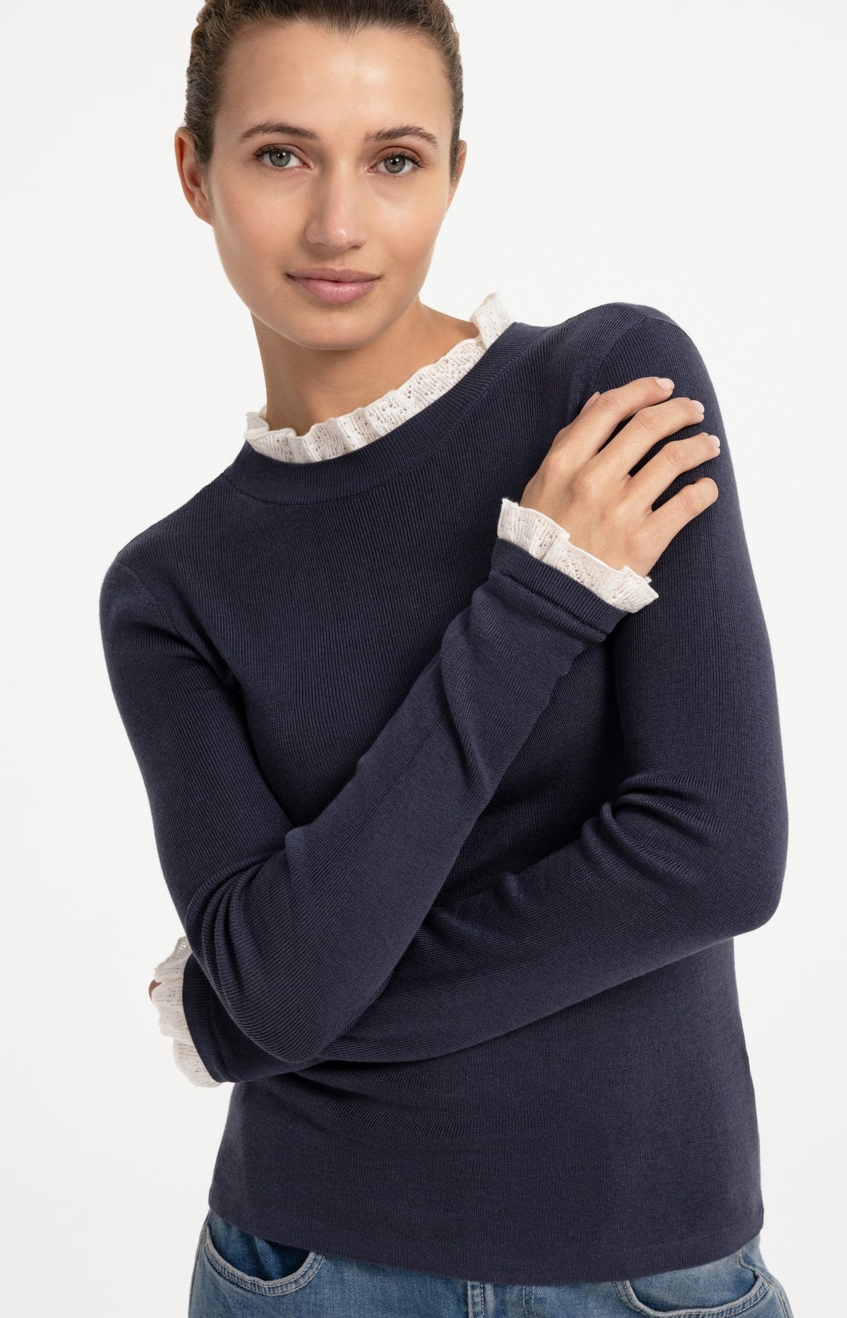 Fine knit rib top with ruffle details