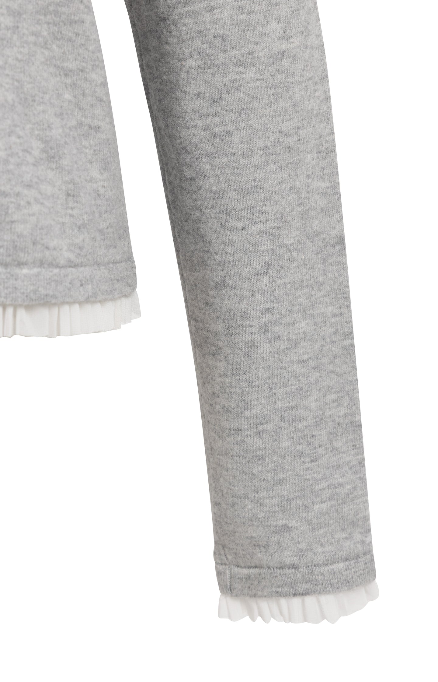 Fine knit top with woven ruffle trims