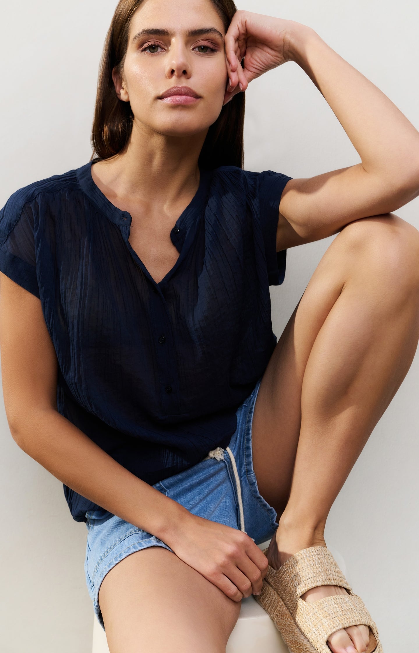 Flowy blouse with polo collar and cap sleeves