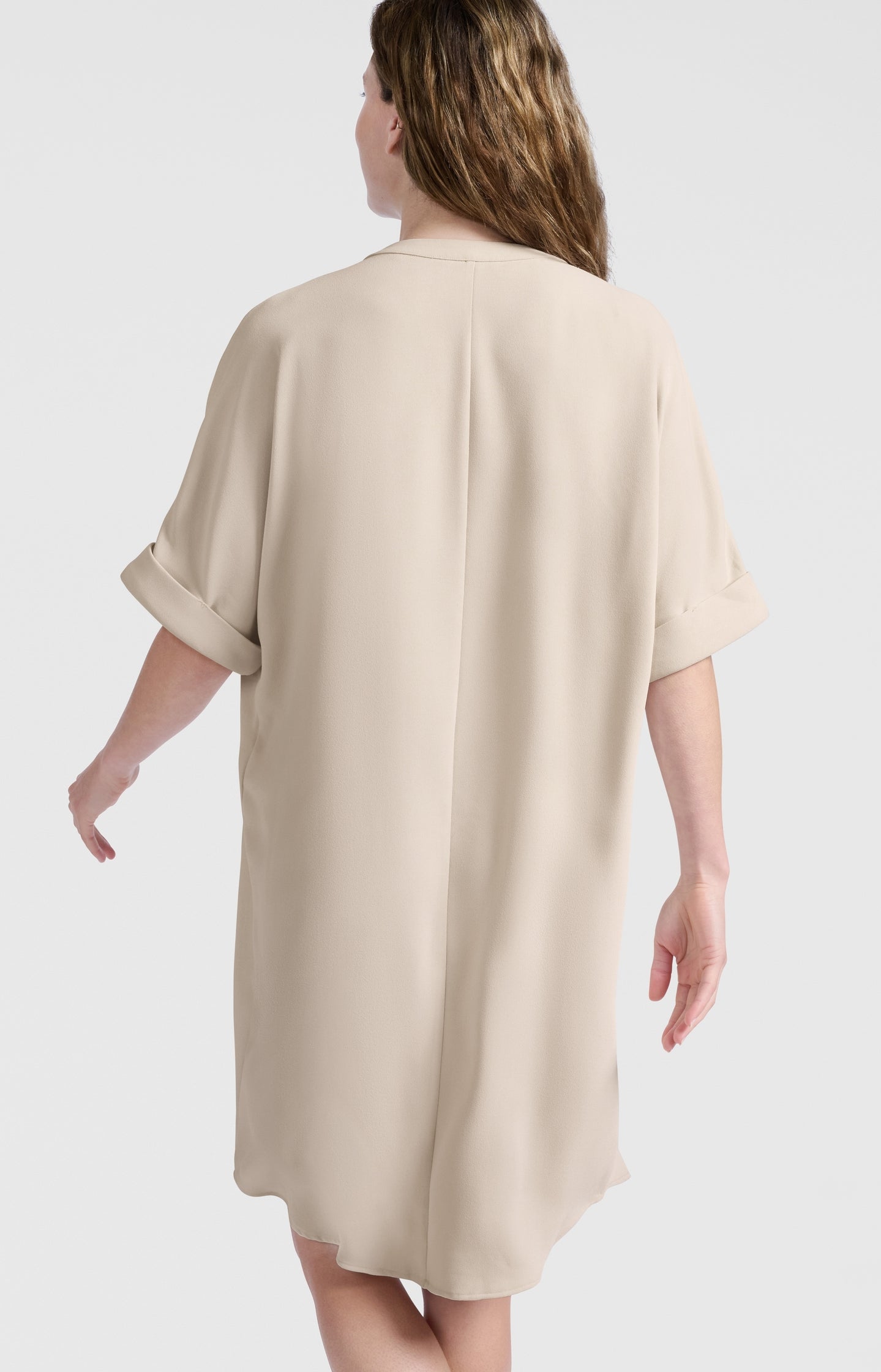 Flowy dress with V-neck and folded sleeves