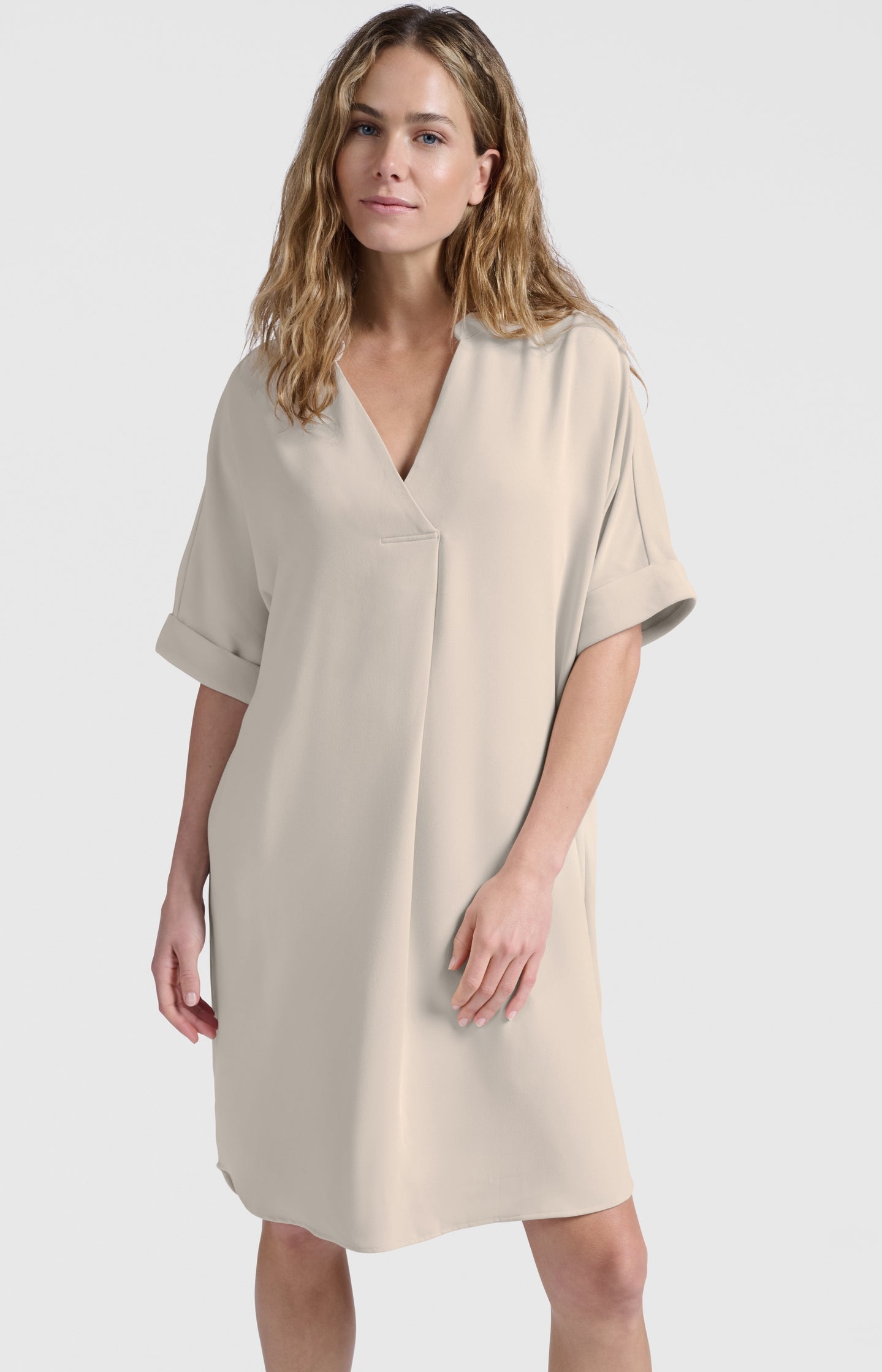 Flowy dress with V-neck and folded sleeves