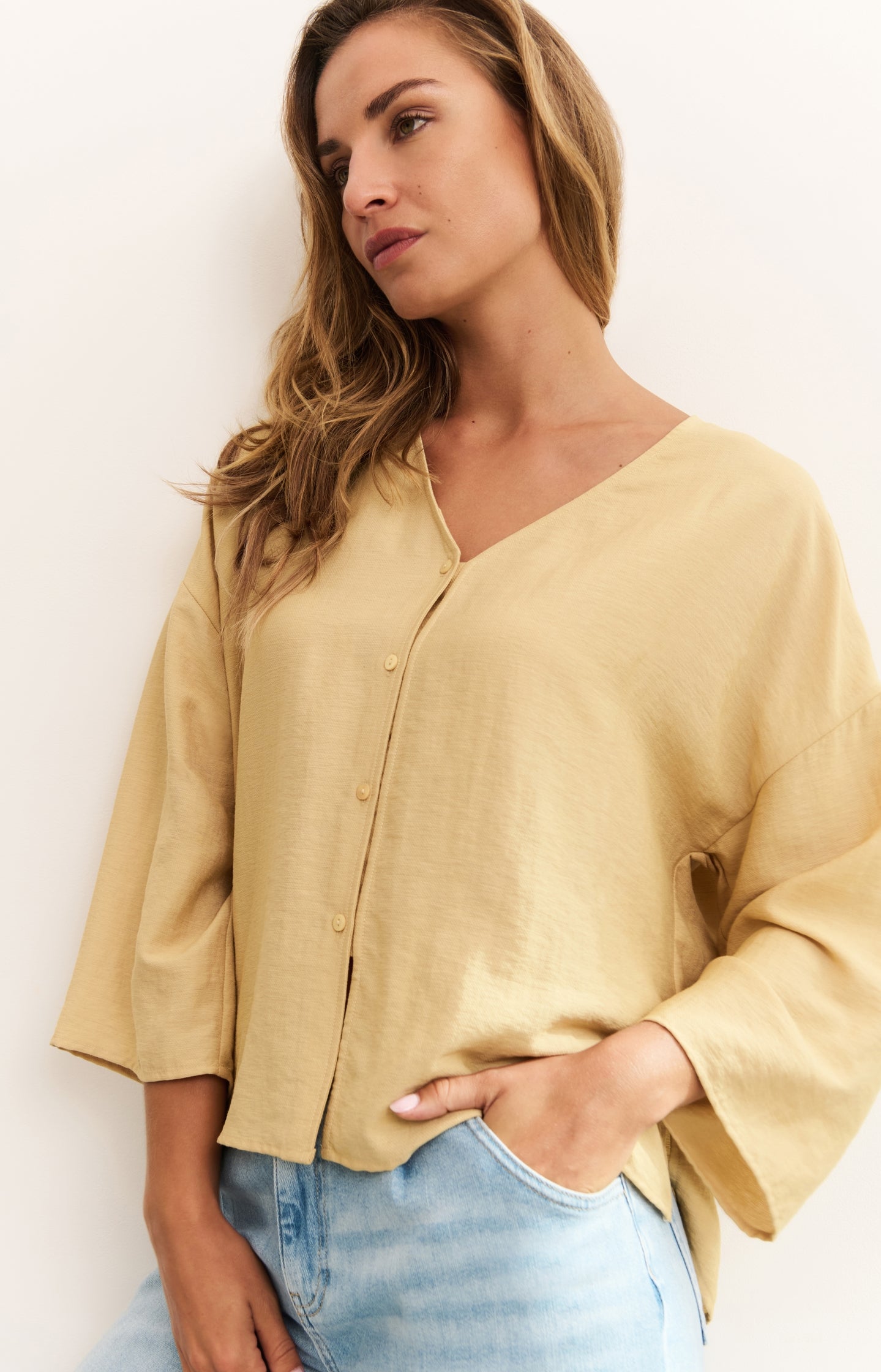 Flowy V-neck blouse with loose fit