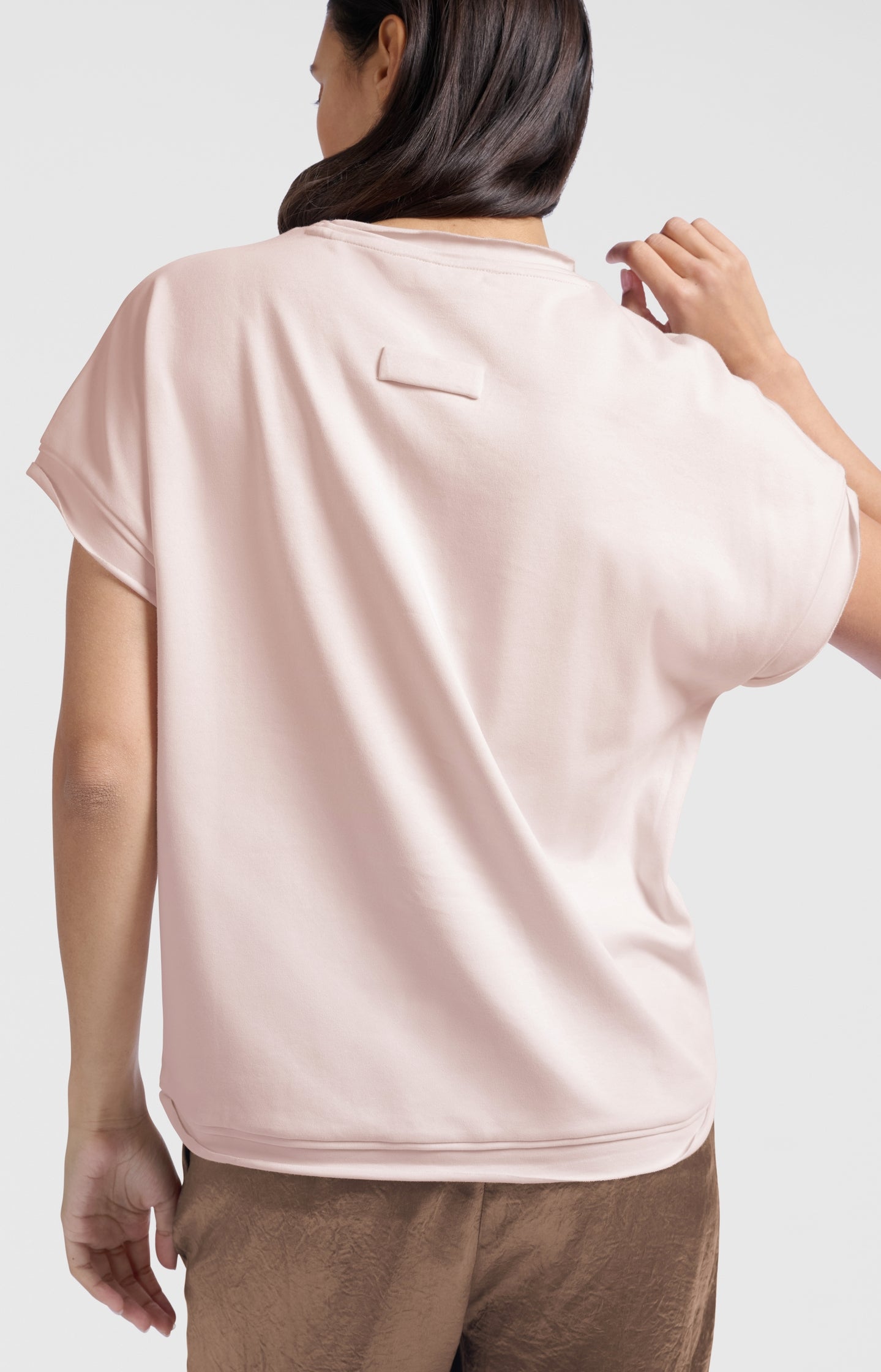 Heavy weight top with short sleeves and raw-edge finish