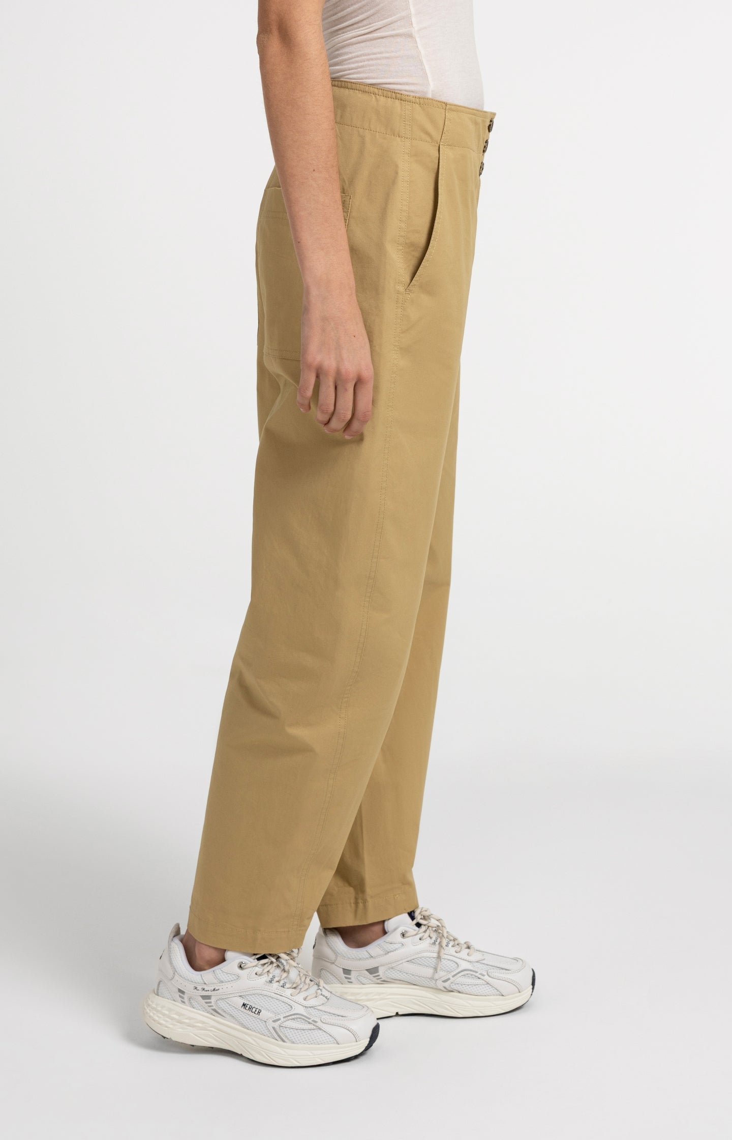 High-waist barrel-leg trousers with button detail