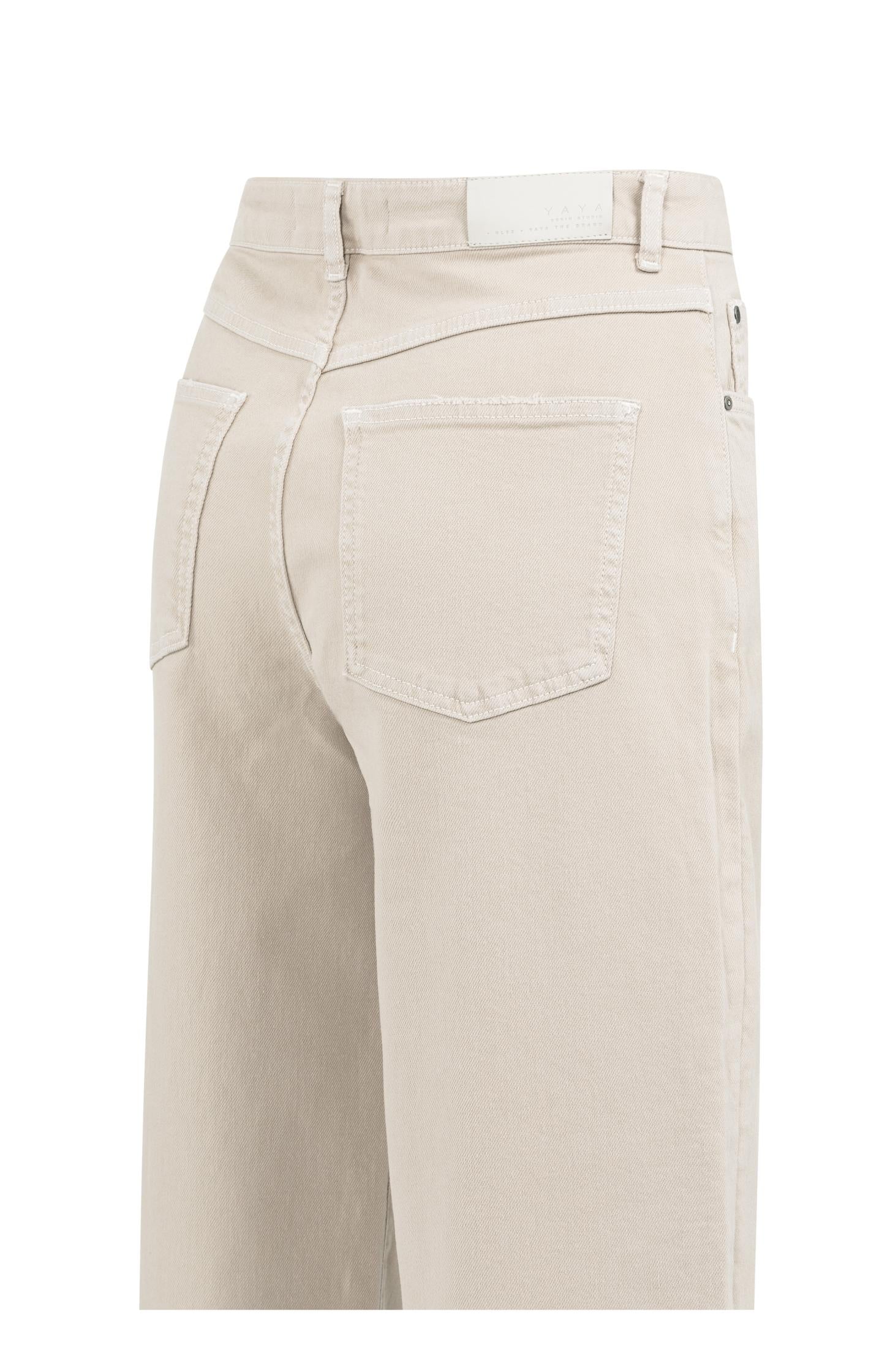 High-waist beige jeans with loose fit