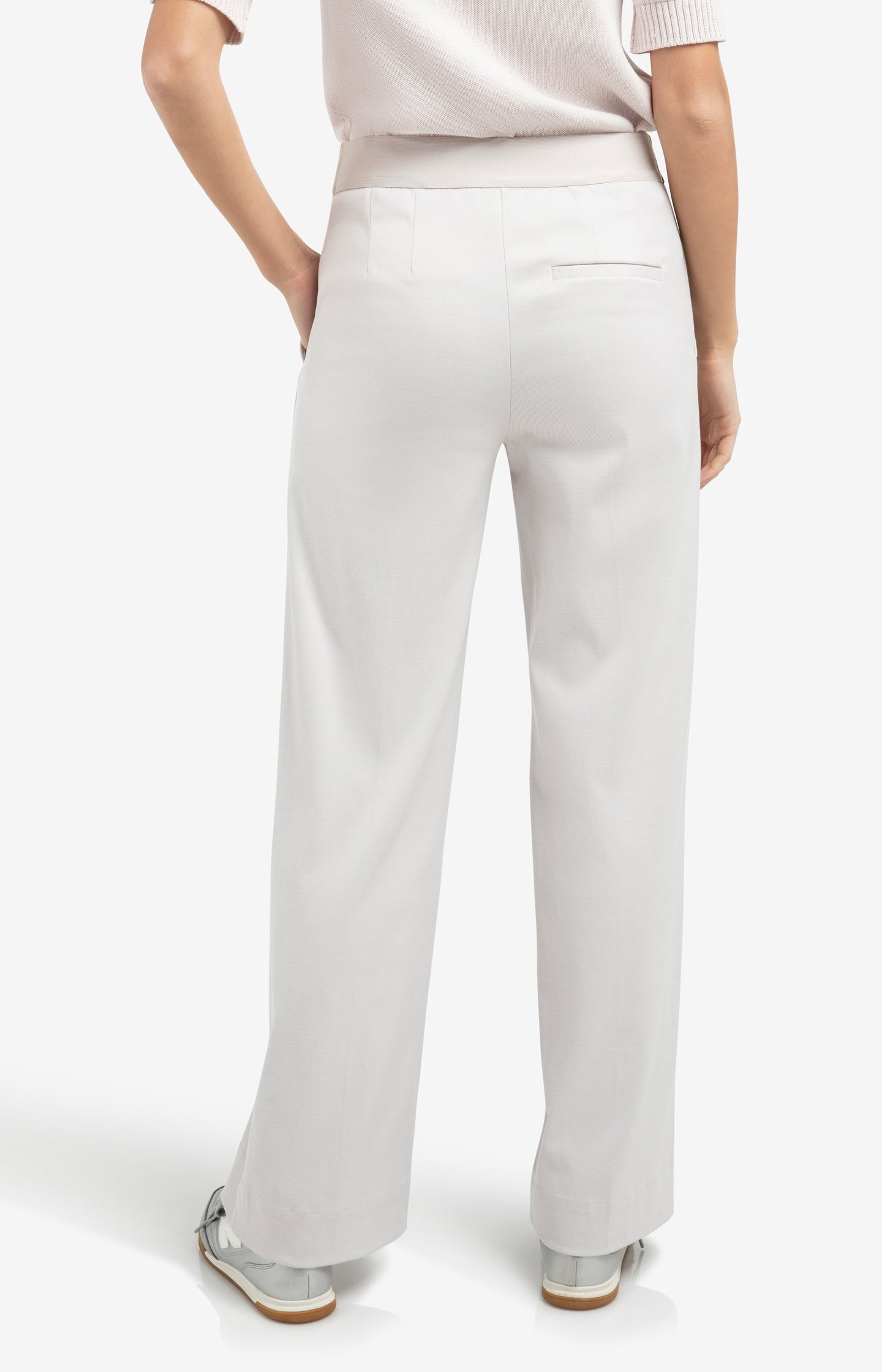 High waist trousers with decorative buttons and wide legs